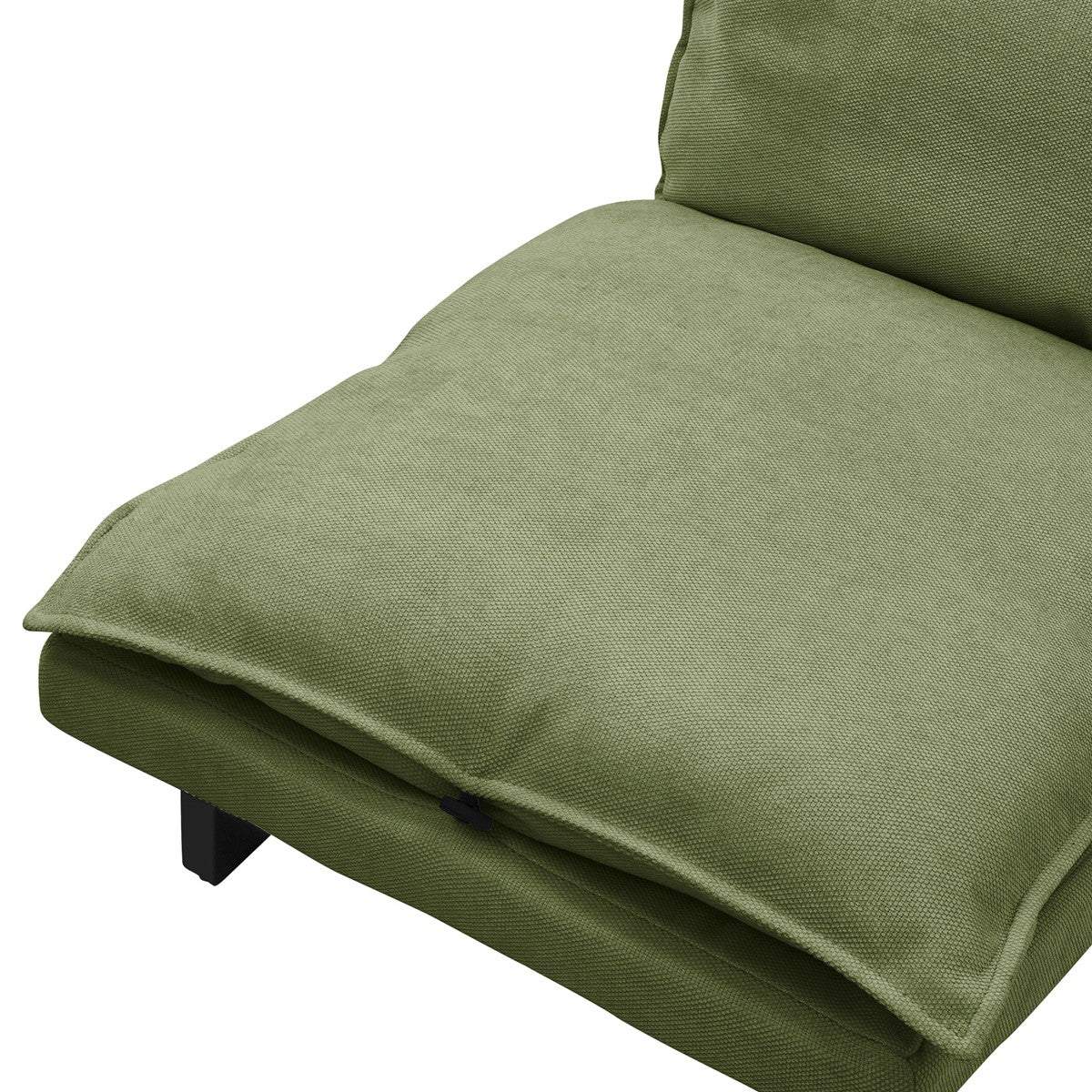 A green armchair with a large, soft cushion in a relaxed position.