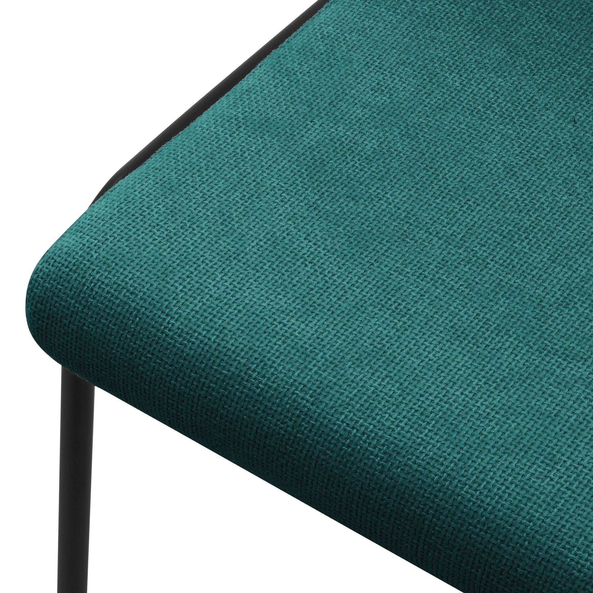 Primer plano del asiento de una silla verde.