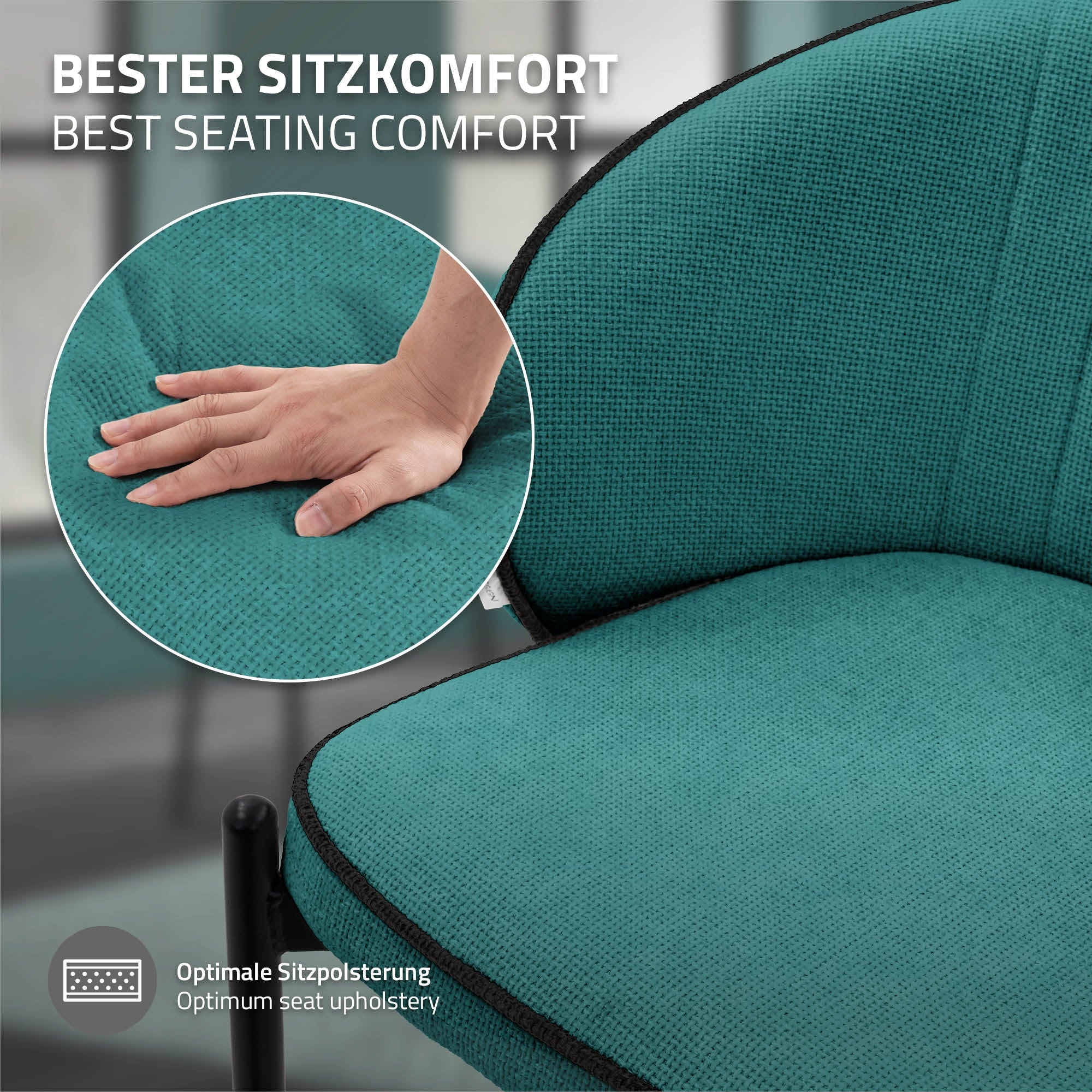 Close-up of a turquoise chair with a hand on the upholstery.