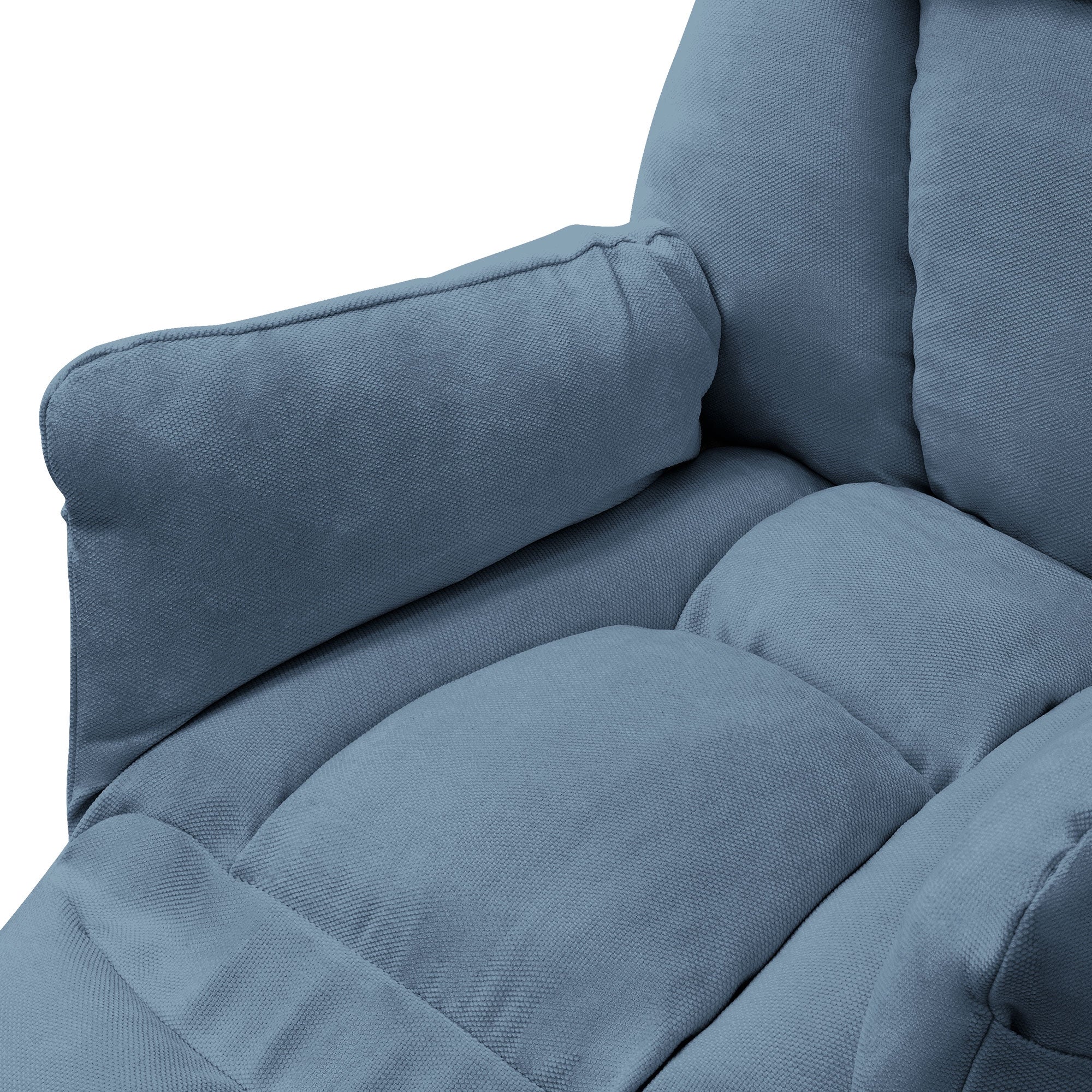 Close-up of a blue armchair with padded armrests.