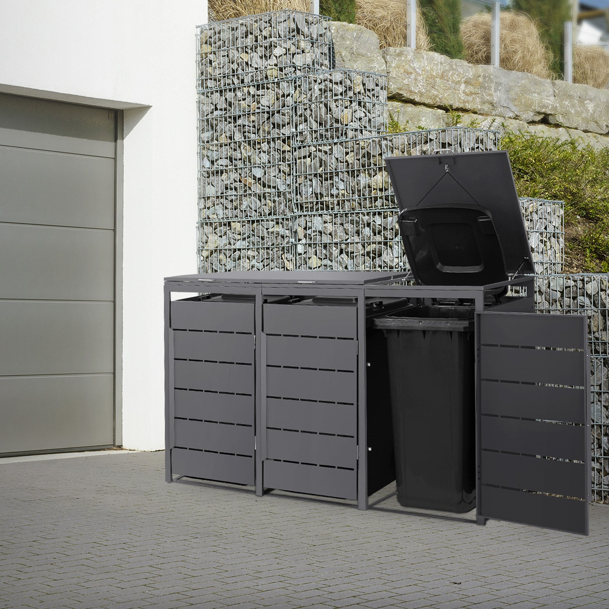 Mülltonnenbox mit geöffnetem Deckel und Mülltonne sichtbar.
