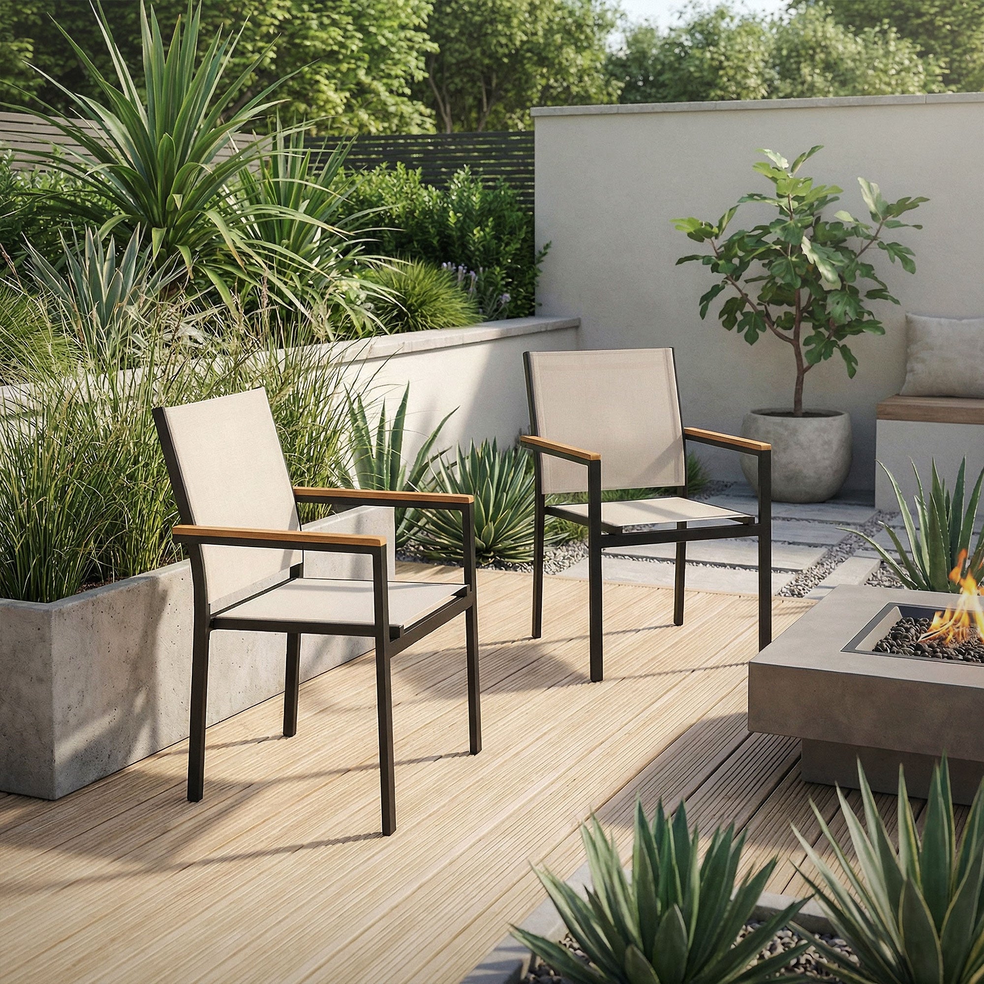 Two chairs on a terrace surrounded by plants and a fire pit.