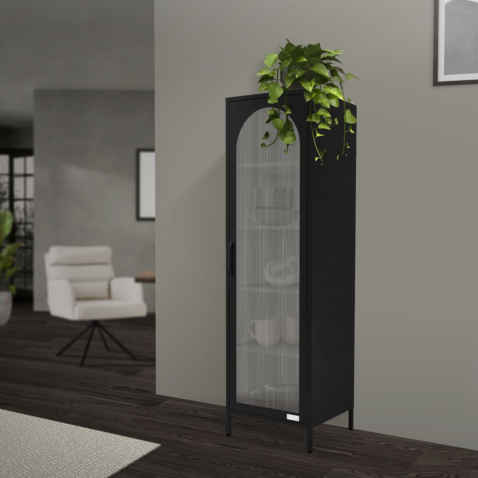 Vitrine noire avec porte fermée et plantes sur le dessus.
