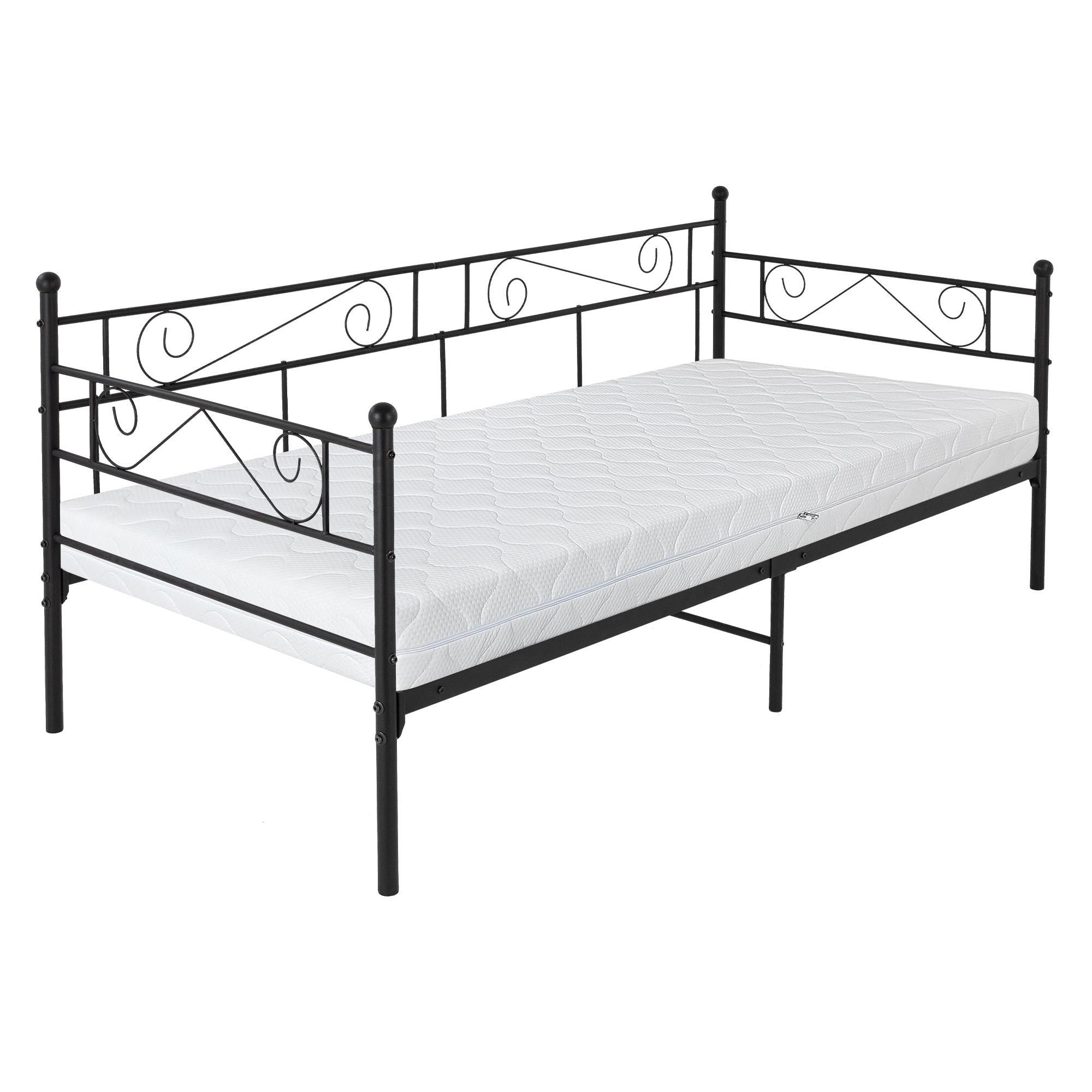 Zwart metalen bed met gebogen elementen en matras.