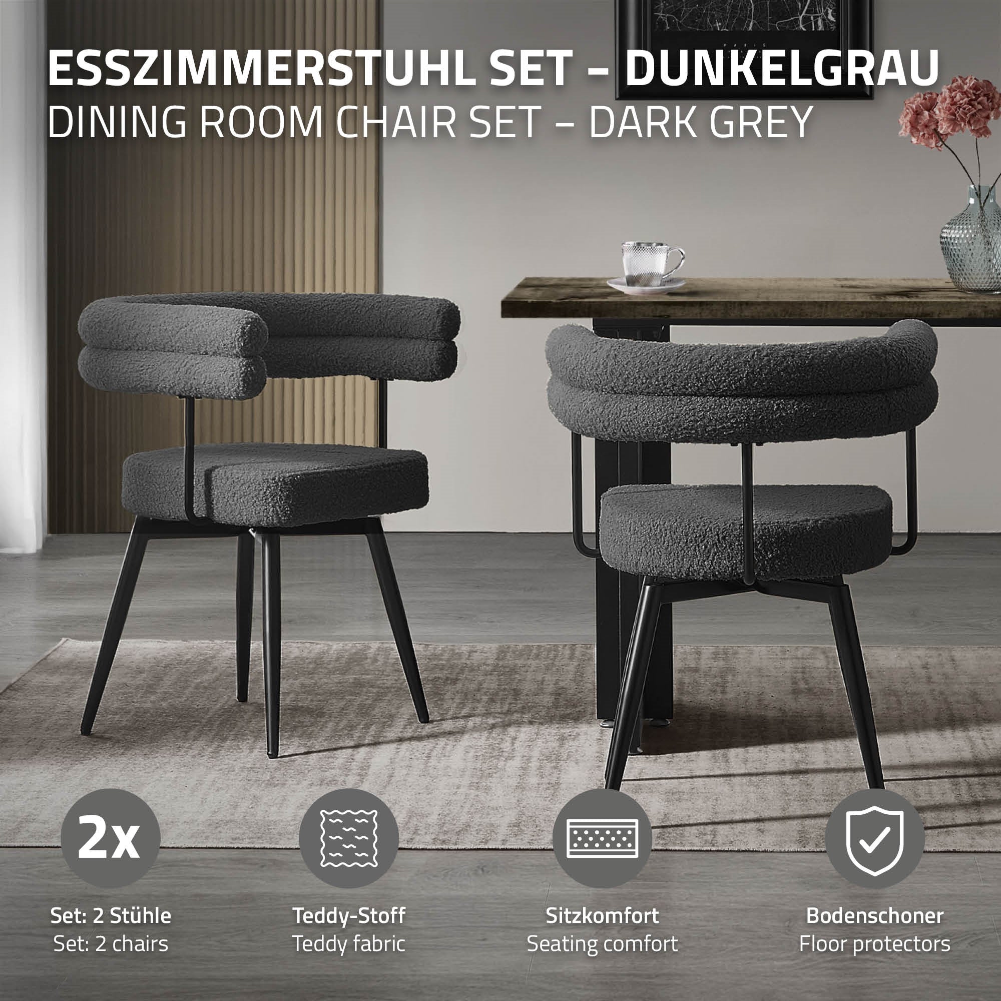 Zwei dunkelgraue Esszimmerstühle mit runden Rückenlehnen und schwarzen Beinen.