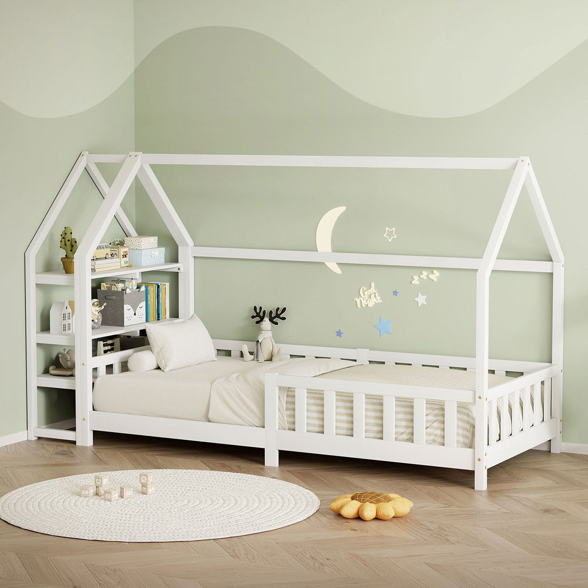 White house-shaped bed with decorations and pillows.
