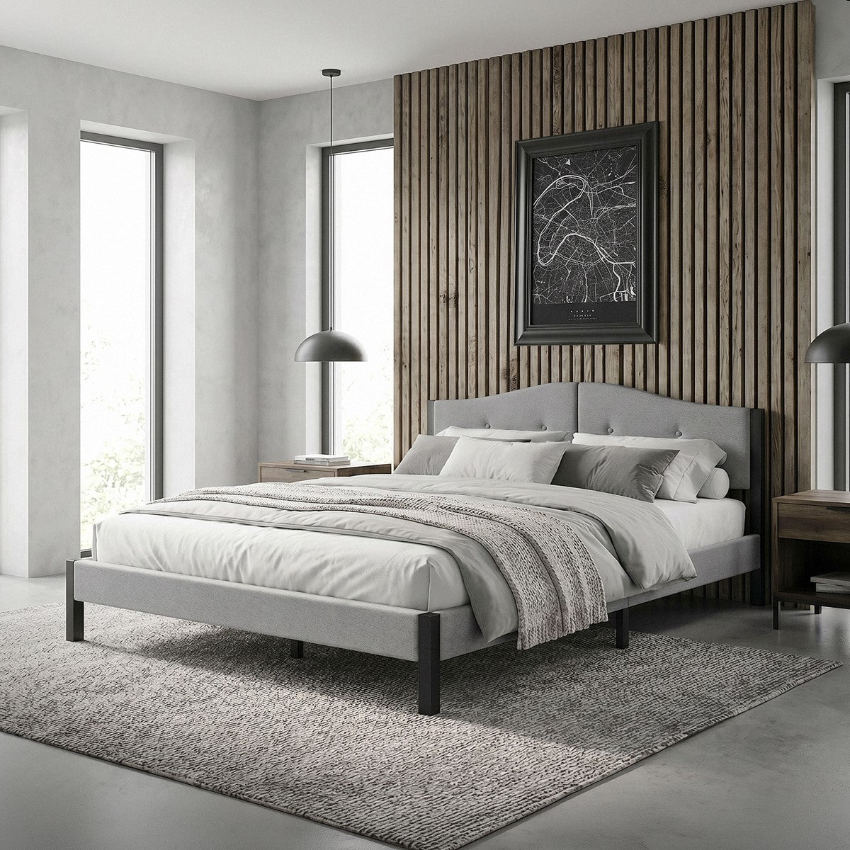 A modern bedroom with a gray bed and wood paneling on the wall.