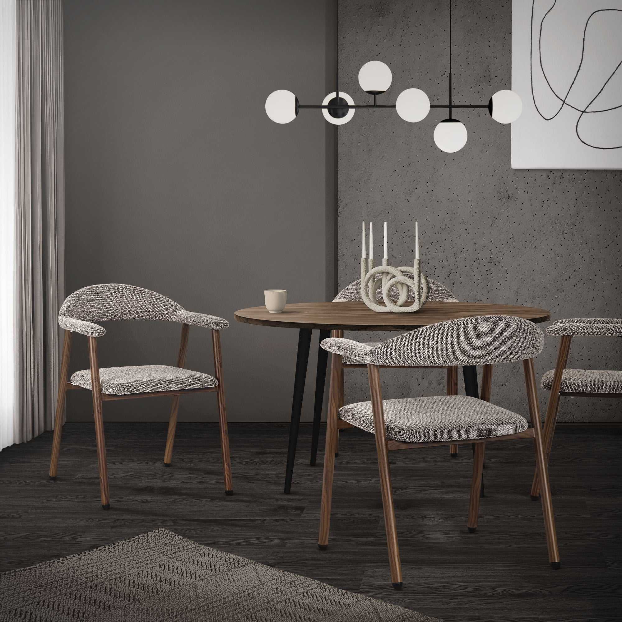 Ein Esszimmer mit einem runden Tisch und zwei braunen Stühlen in einem modernen Raum.
