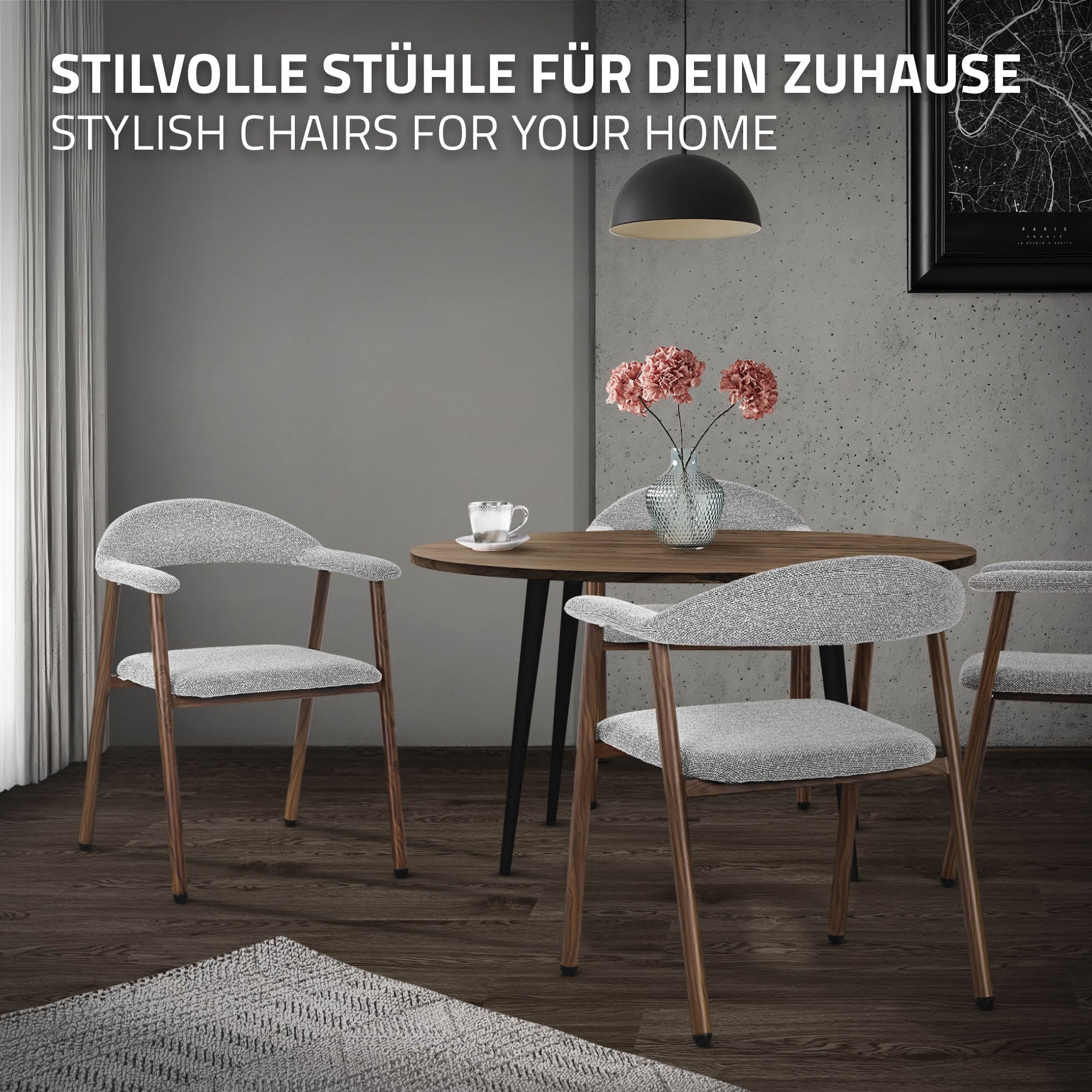 Ein stilvoller Tisch mit zwei Stühlen und einer Blumenvase auf dem Tisch.