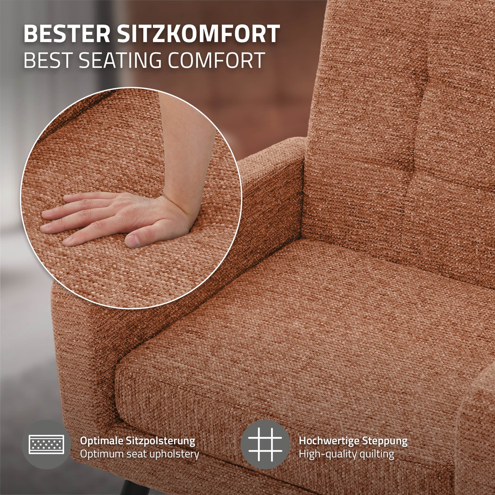 Primer plano de una mano sobre un sillón marrón.