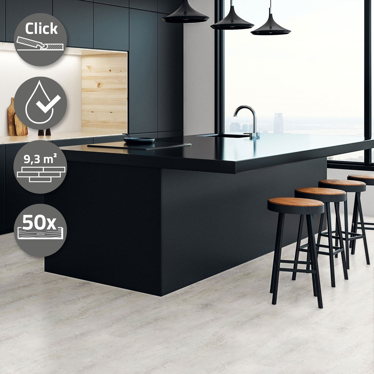 Kitchen island with a black countertop and wooden bar stools, large windows in the background.