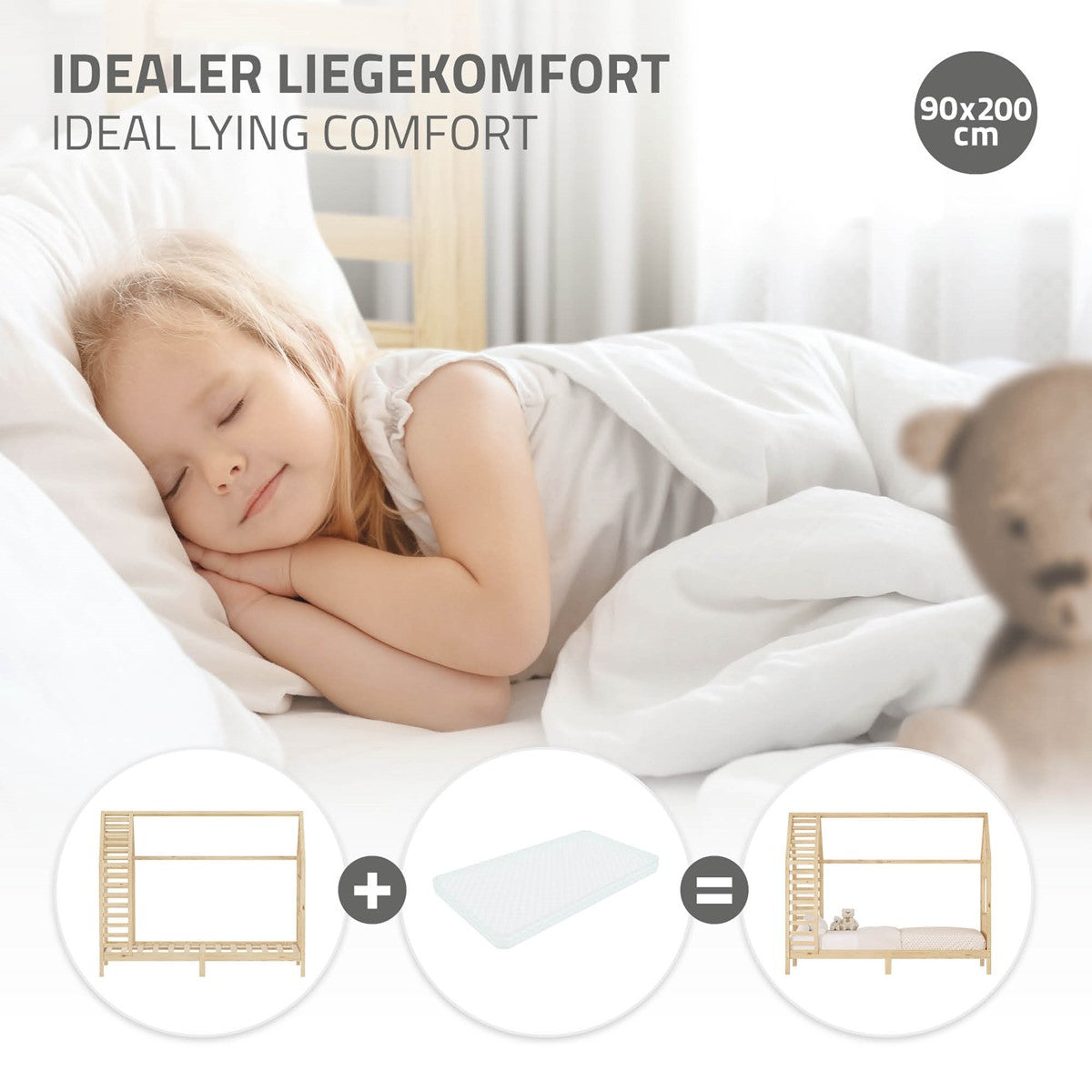 Ein schlafendes Kind auf einem Bett mit einer Matratze und einer Decke.