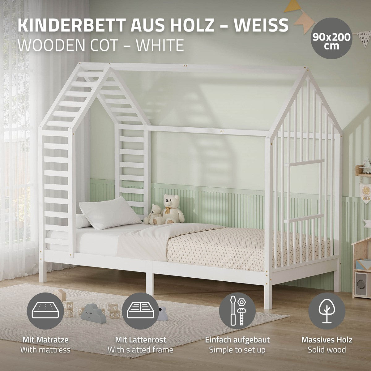 Weißes Holz-Kinderbett mit Matratze und Lattenrost.