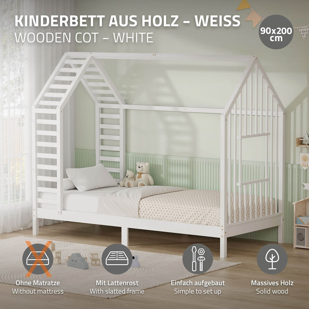 Ein weißes Kinderbett aus Holz mit einem slatted frame und Spielzeug.
