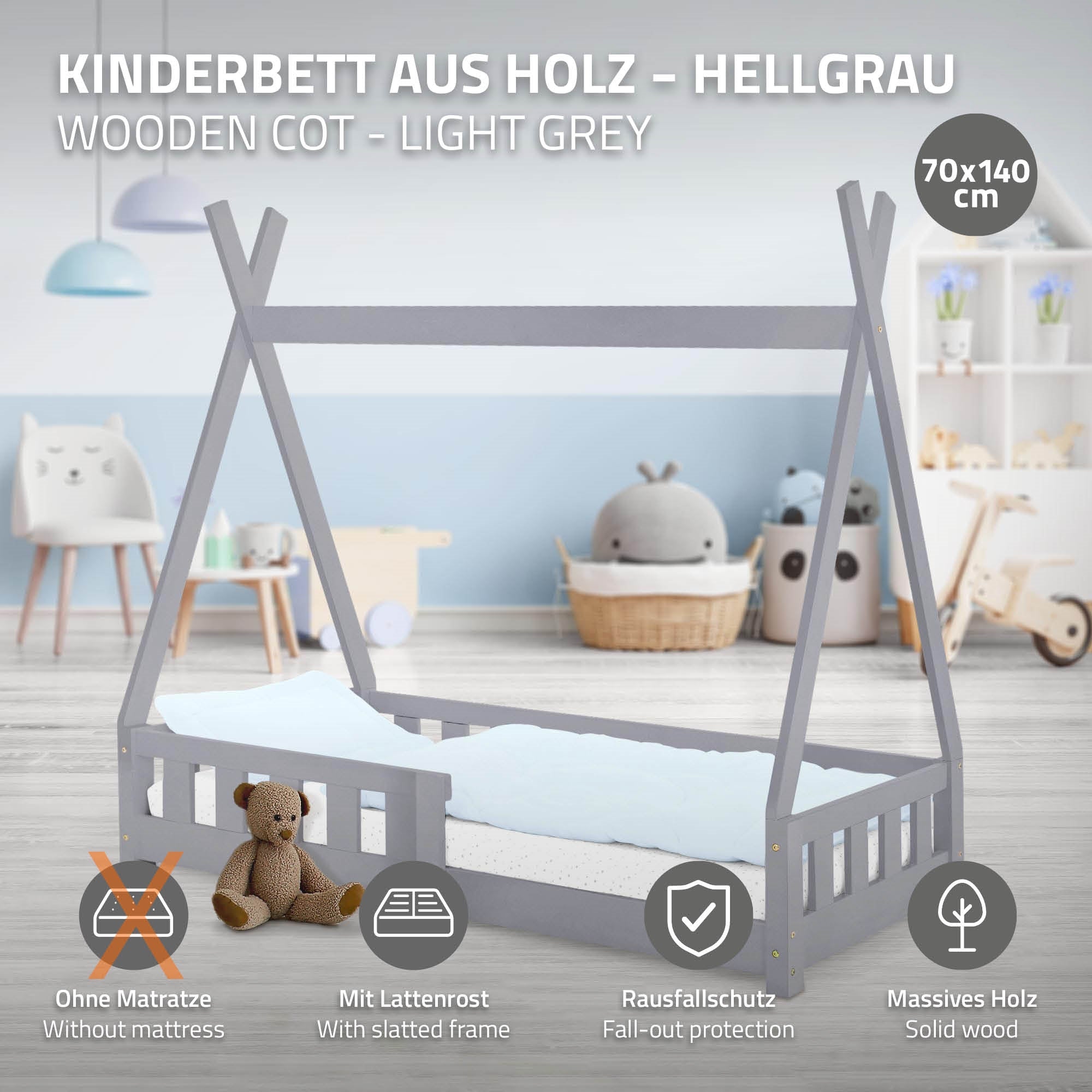Kinderbett aus Holz in hellgrau mit Matratze und Rausfallschutz.