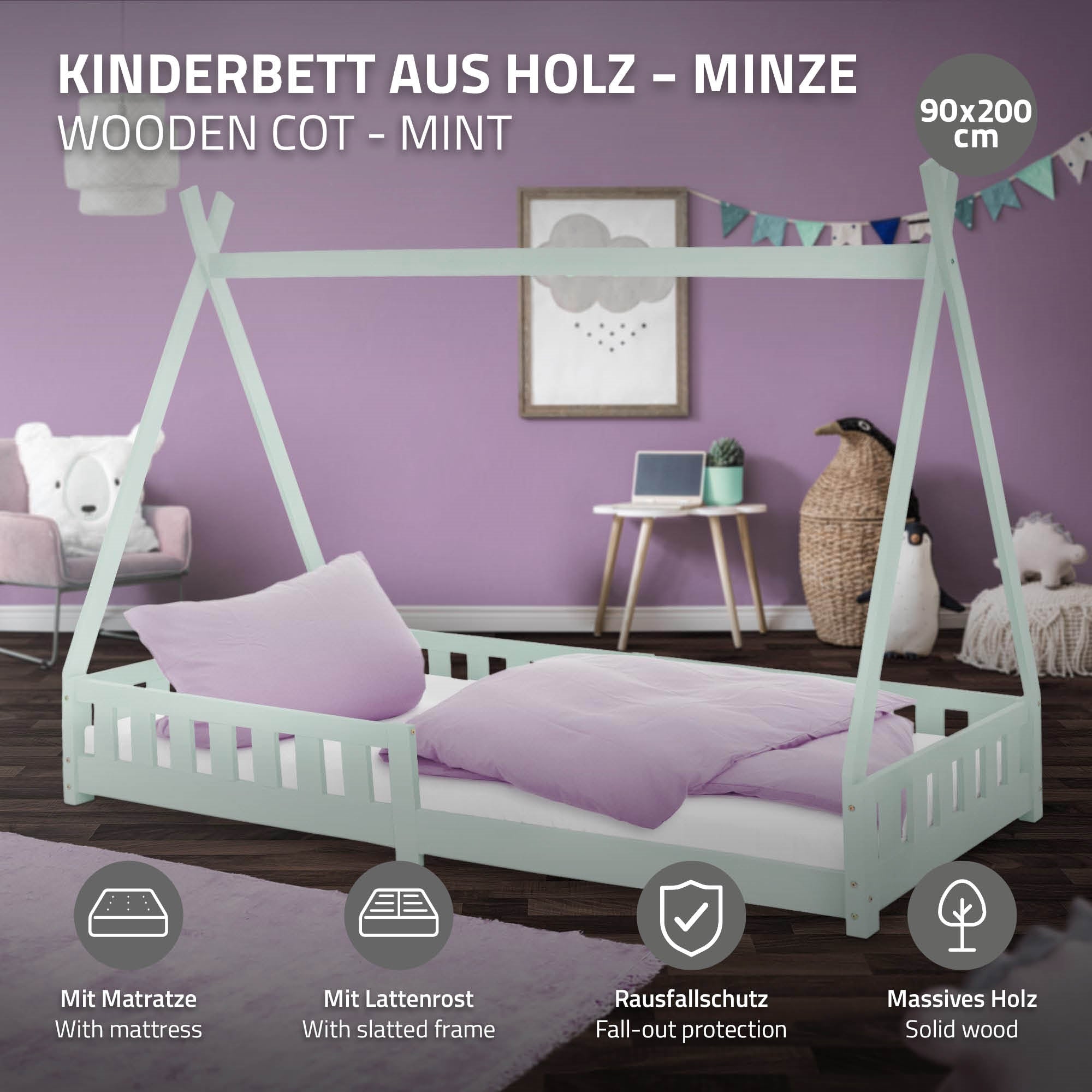 Kinderbett aus Holz in mintgrün mit zwei Kissen.