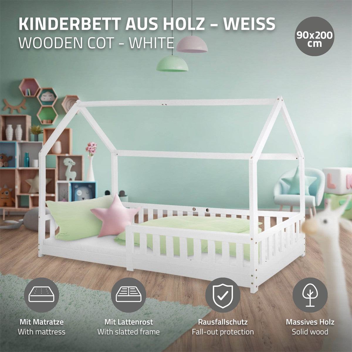 Weißes Kinderbett aus Holz mit Matratze und Rausfallschutz.