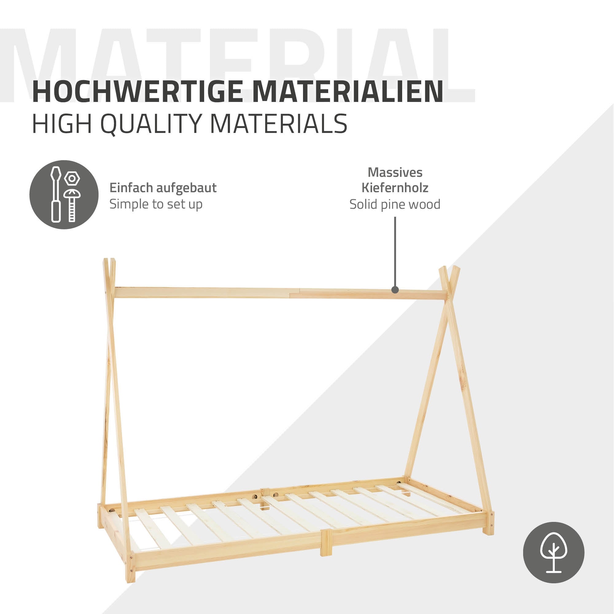 Holz-Kinderbett mit einem slatted frame und einem Stofftier.
