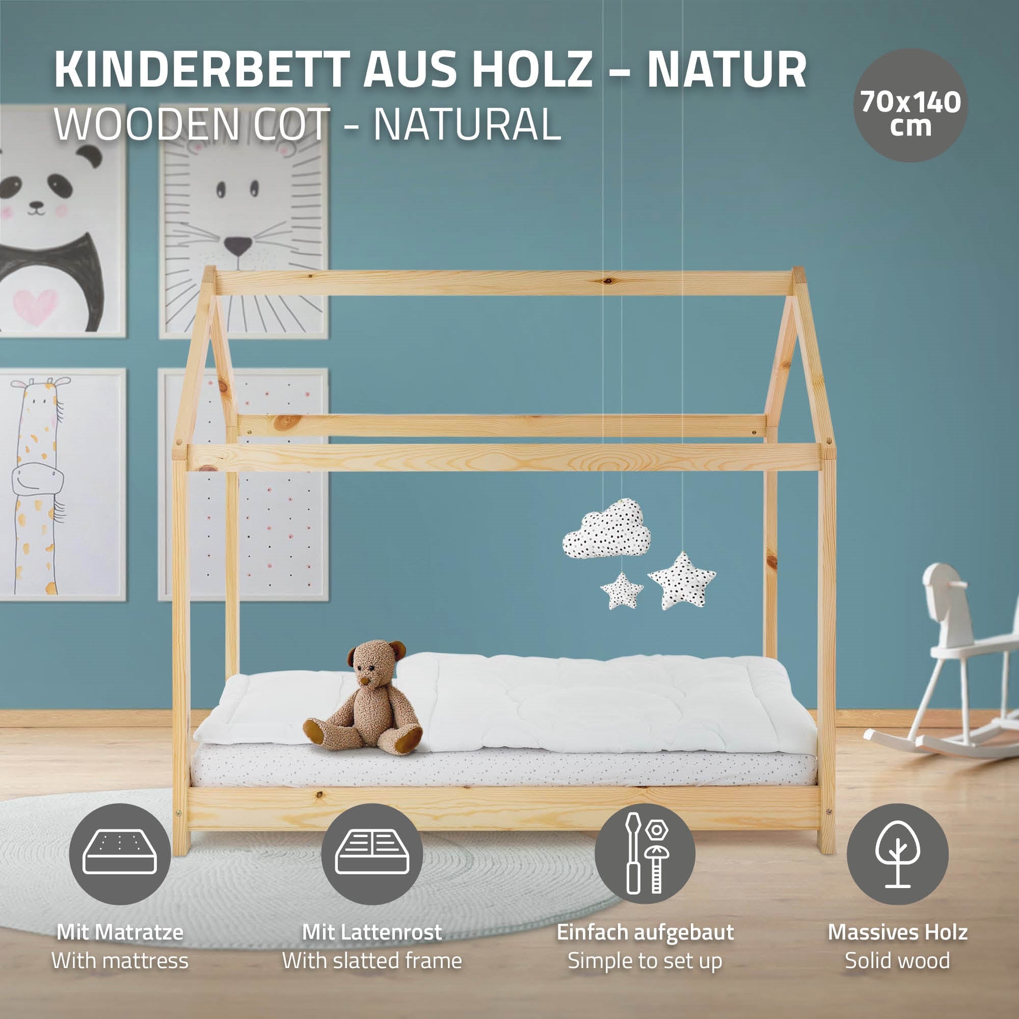 Wooden children's bed with mattress, slatted frame, and cloud decoration.