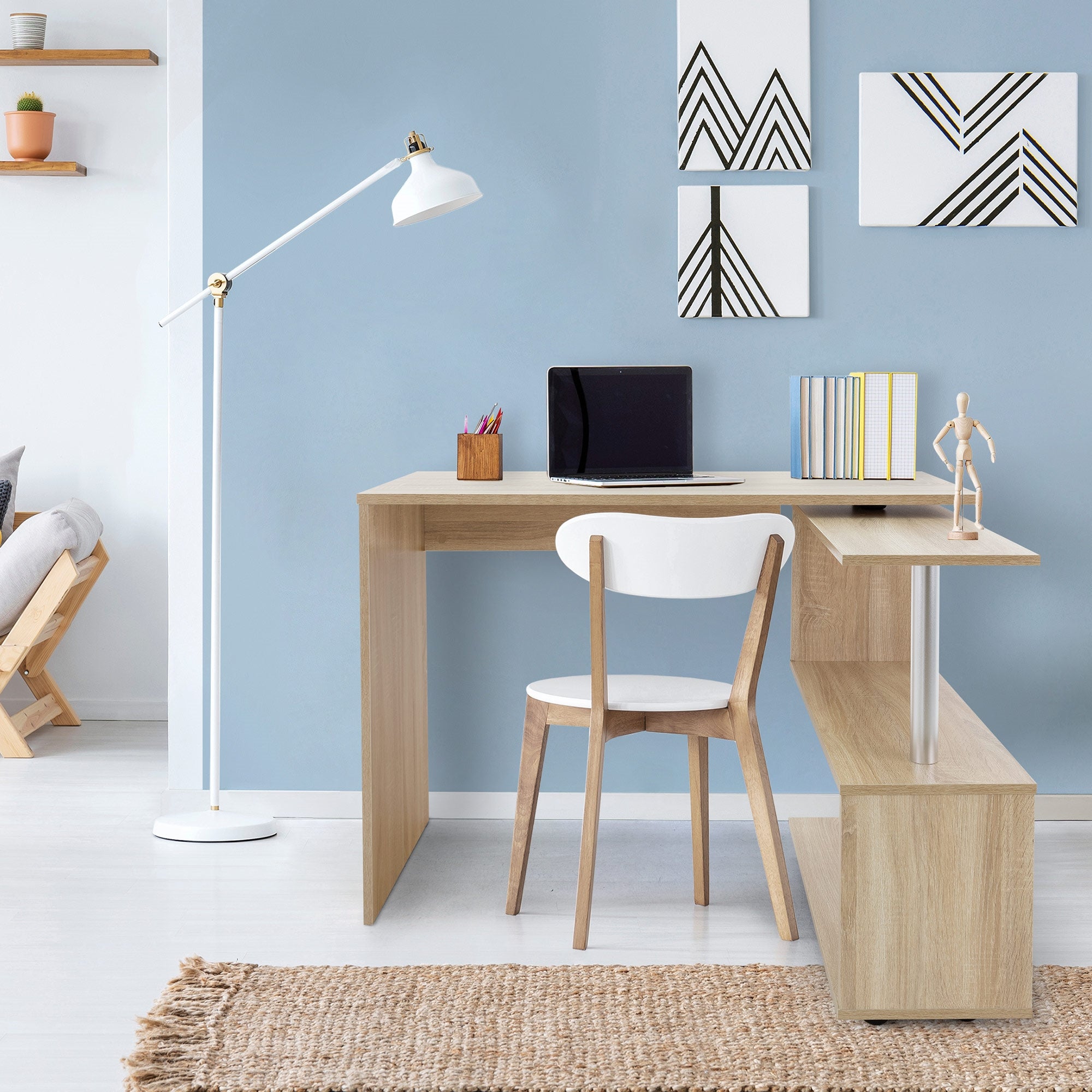 A modern workspace with a wooden desk, chair, and laptop.