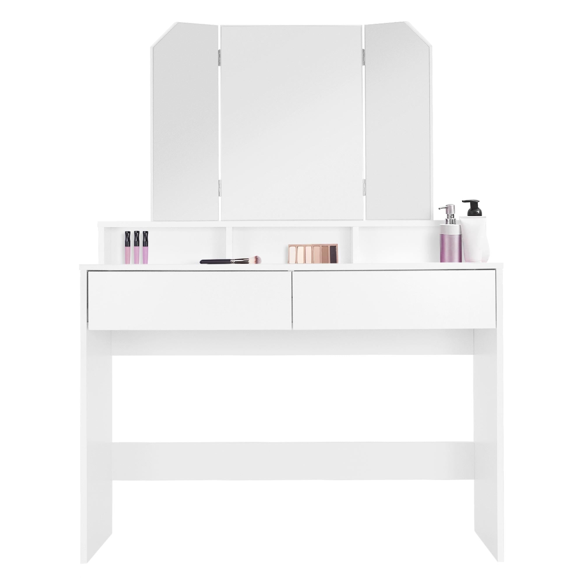 White vanity table with three mirrors and cosmetic products on the surface.