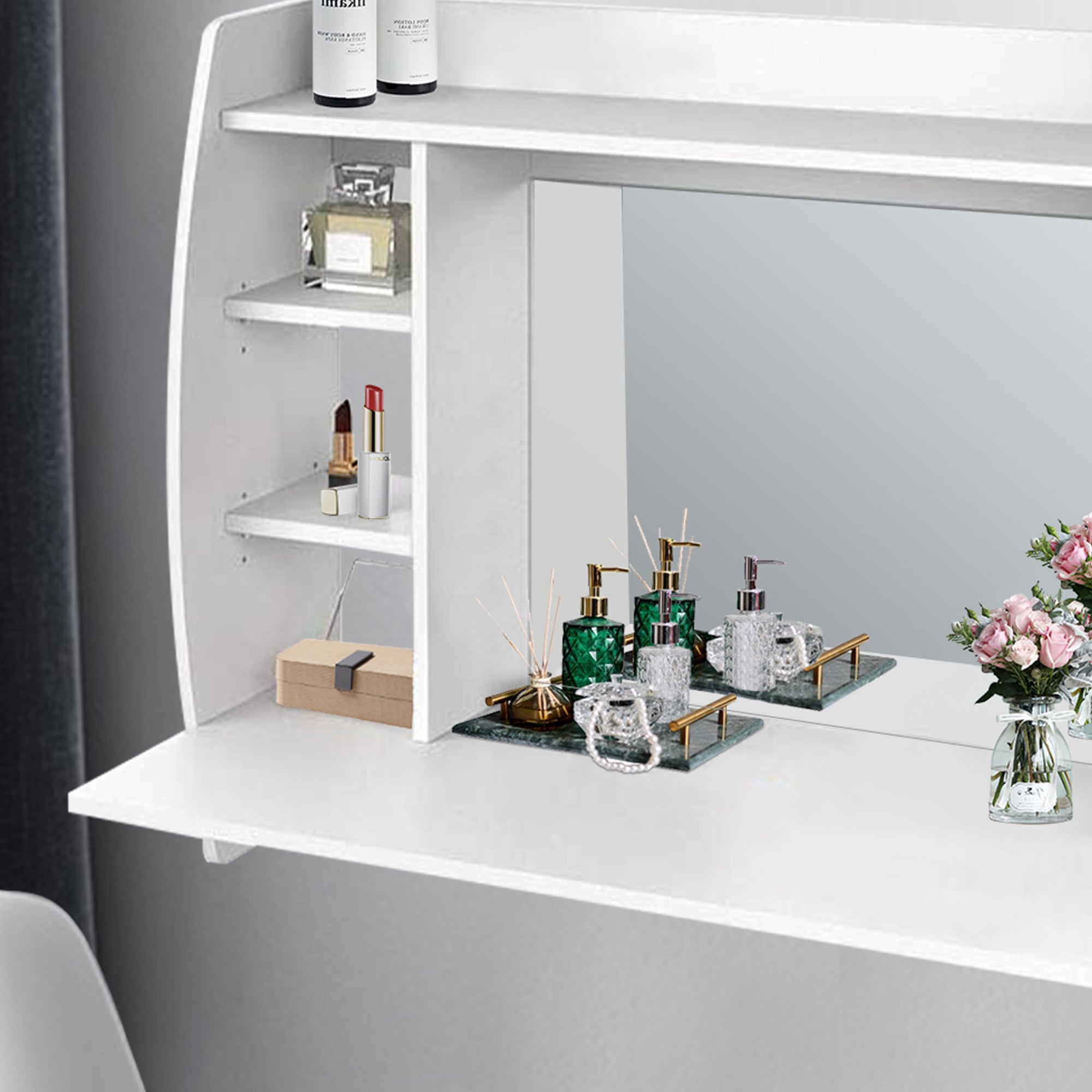 Close-up of a wall table with cosmetics and flowers on the shelf.