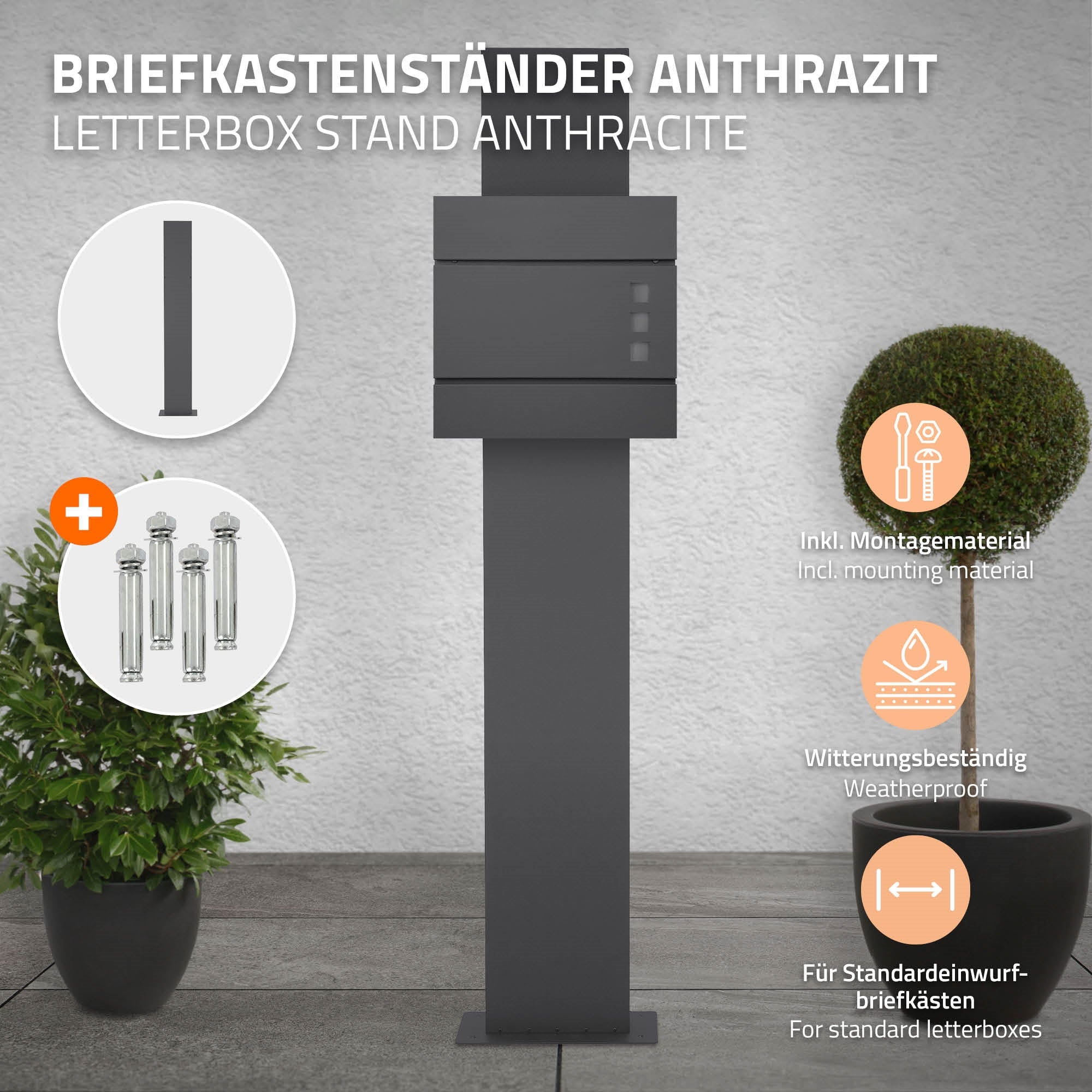 Anthrazitfarbener Briefkastenständer mit Montagezubehör auf einem grauen Boden.