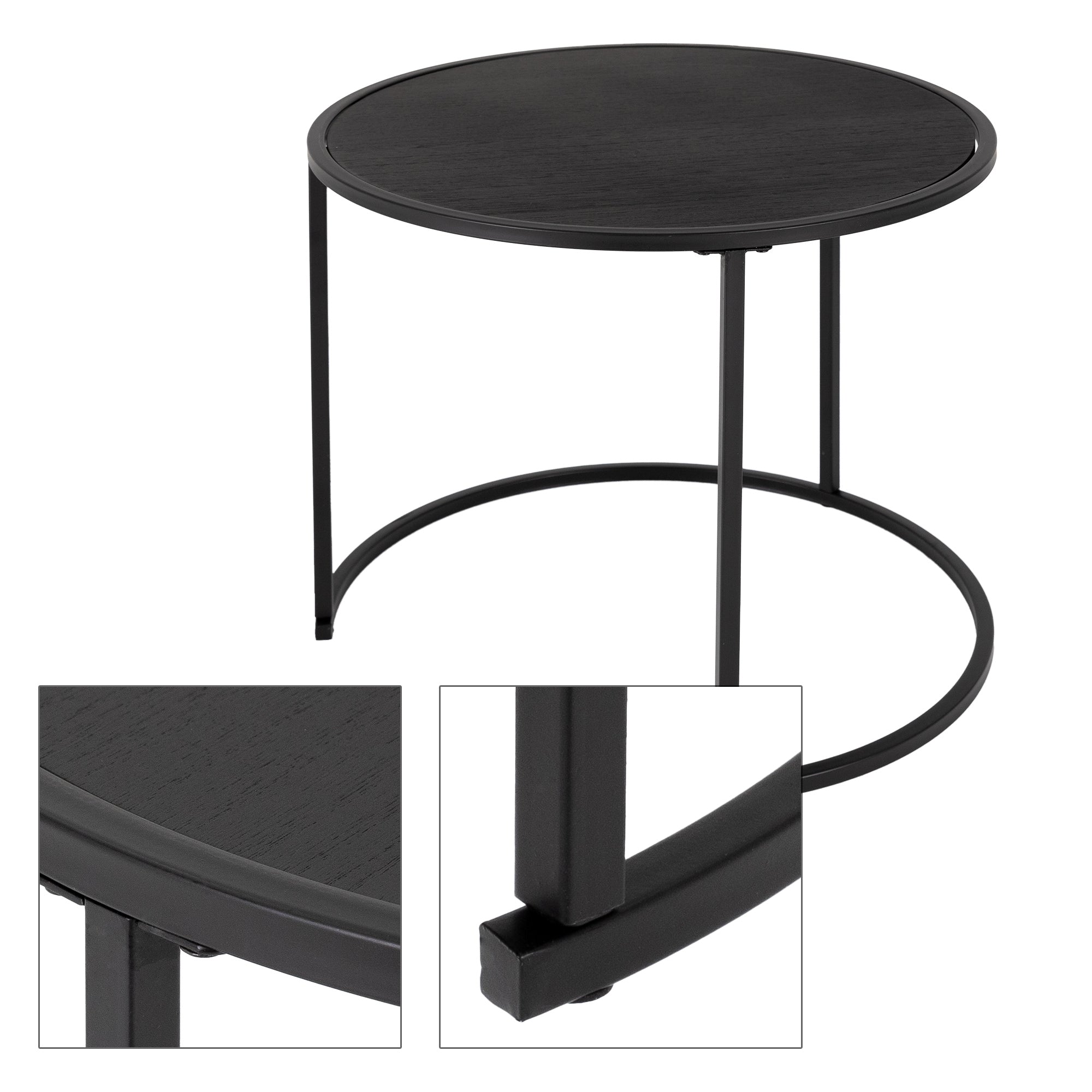 Table ronde noire au design minimaliste.