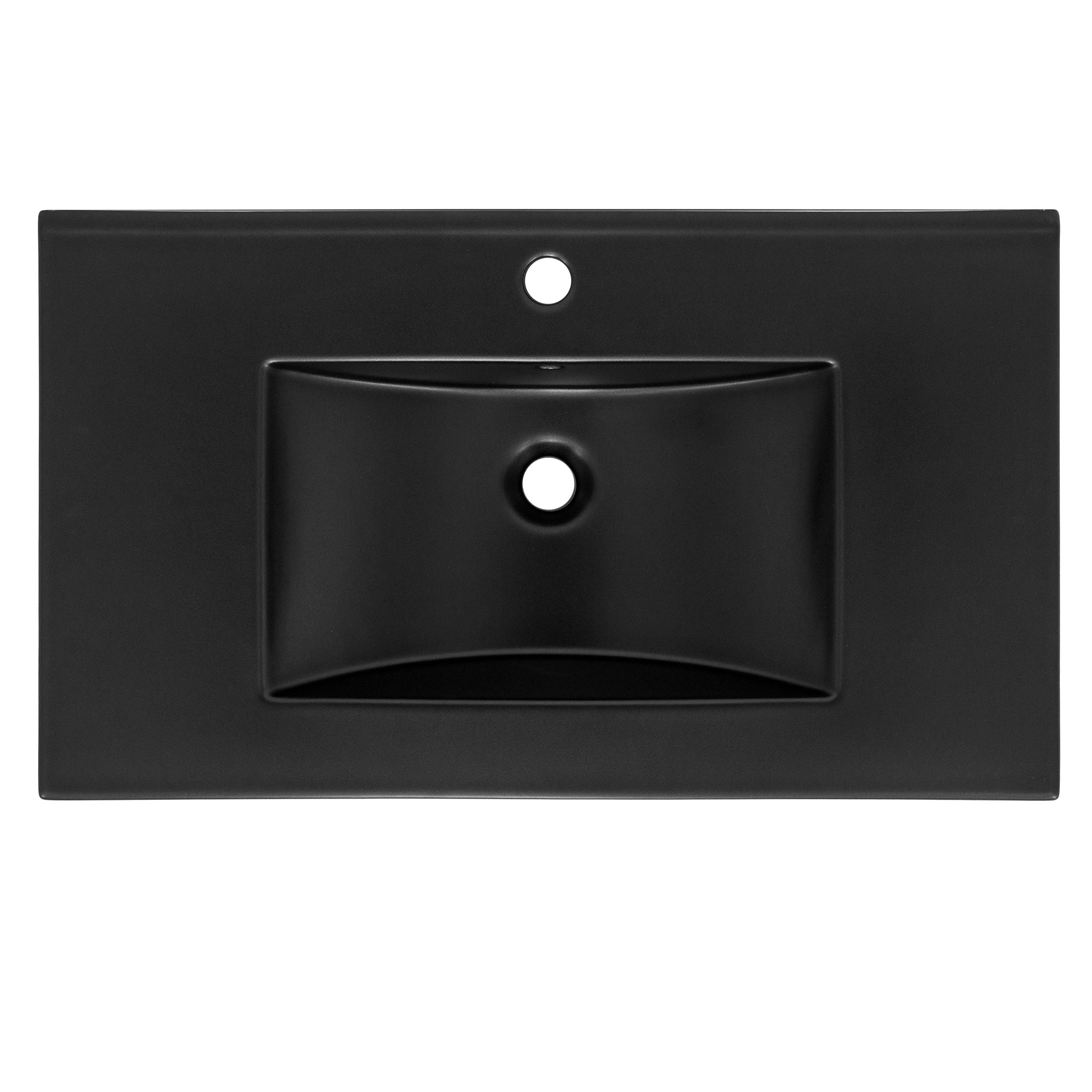 Black sink with rectangular shape and a hole in the center.