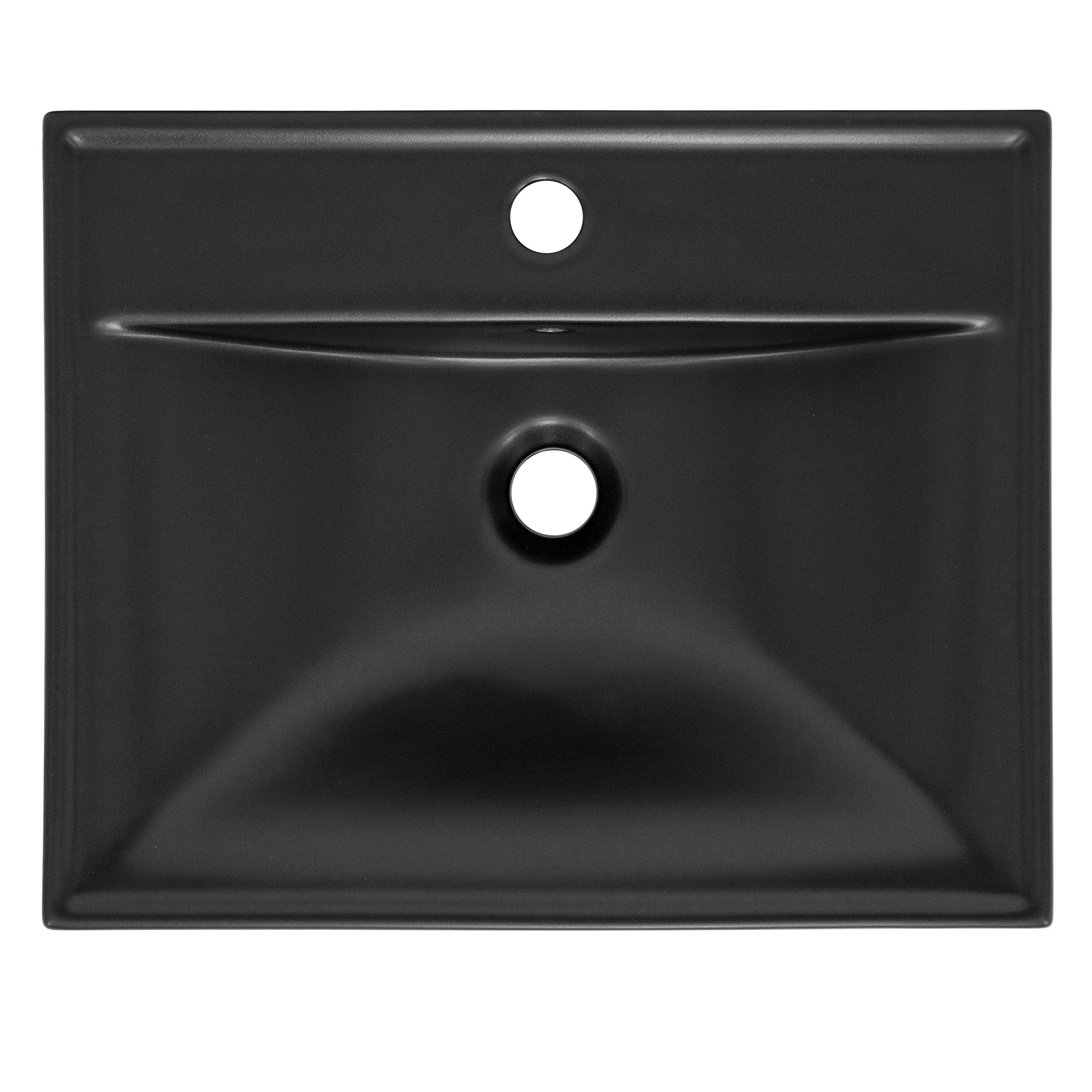 Black sink viewed from the front with a hole in the center.
