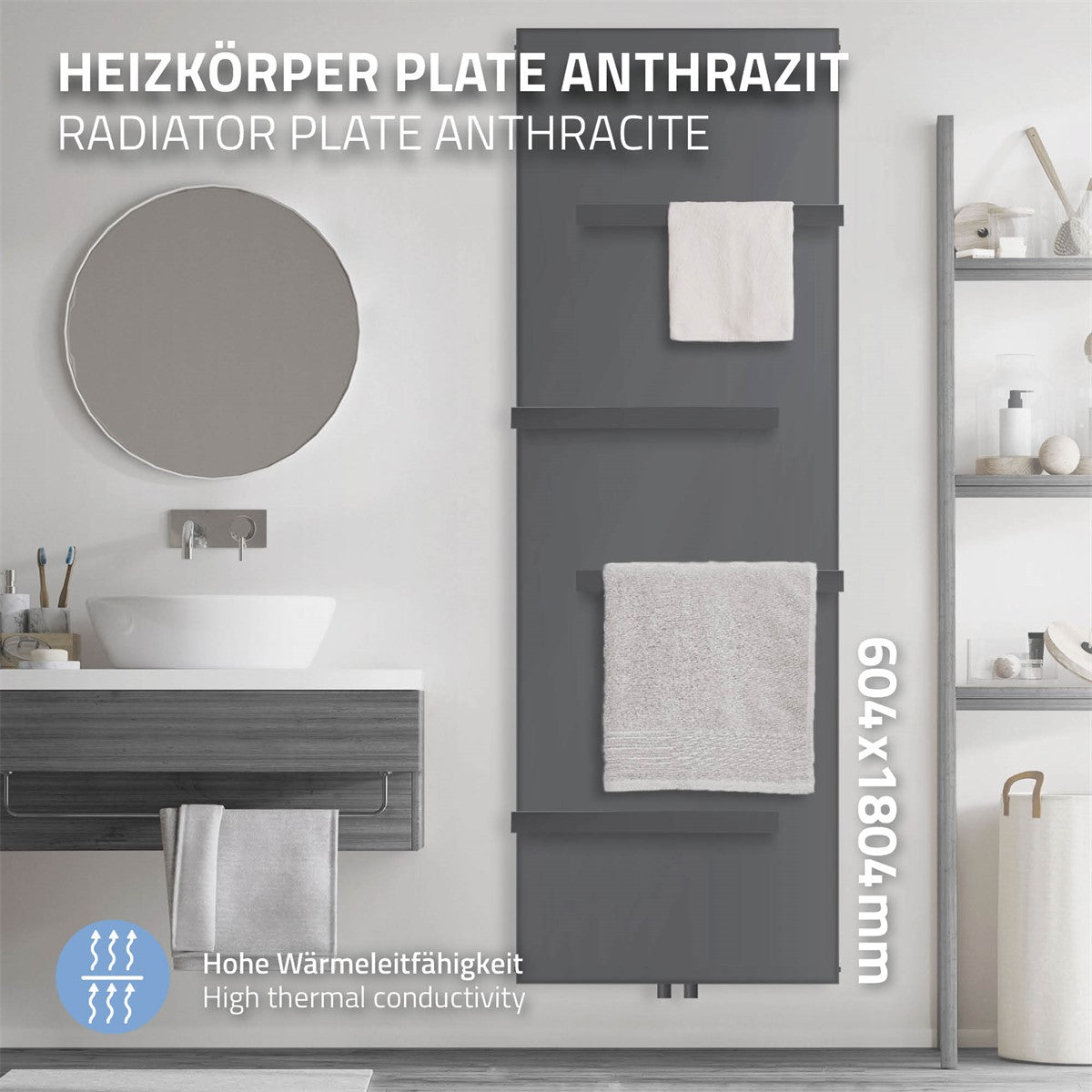 Anthrazitfarbener Heizkörper mit Handtüchern, Wandanschluss und Thermostat.