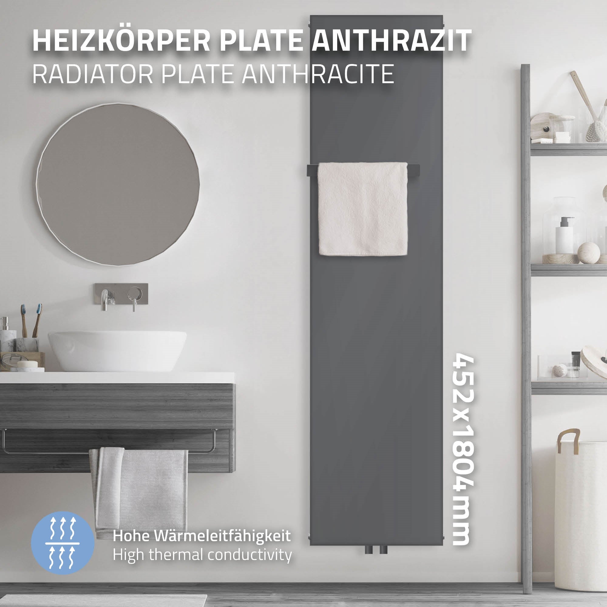 Anthrazitfarbener Heizkörper mit Handtuch und Spiegel im Badezimmer.