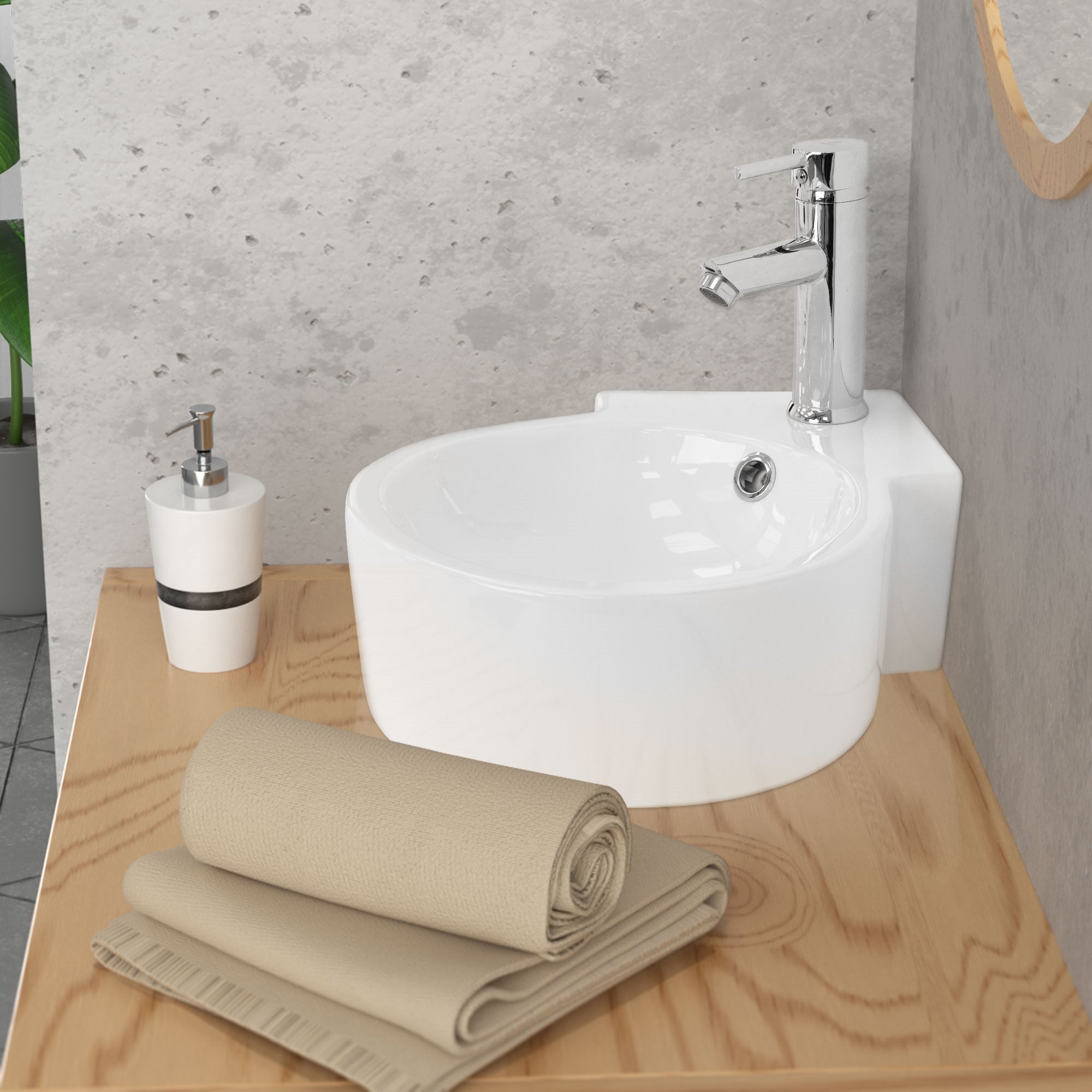 Round sink on a wooden shelf, with towels and soap dispenser.