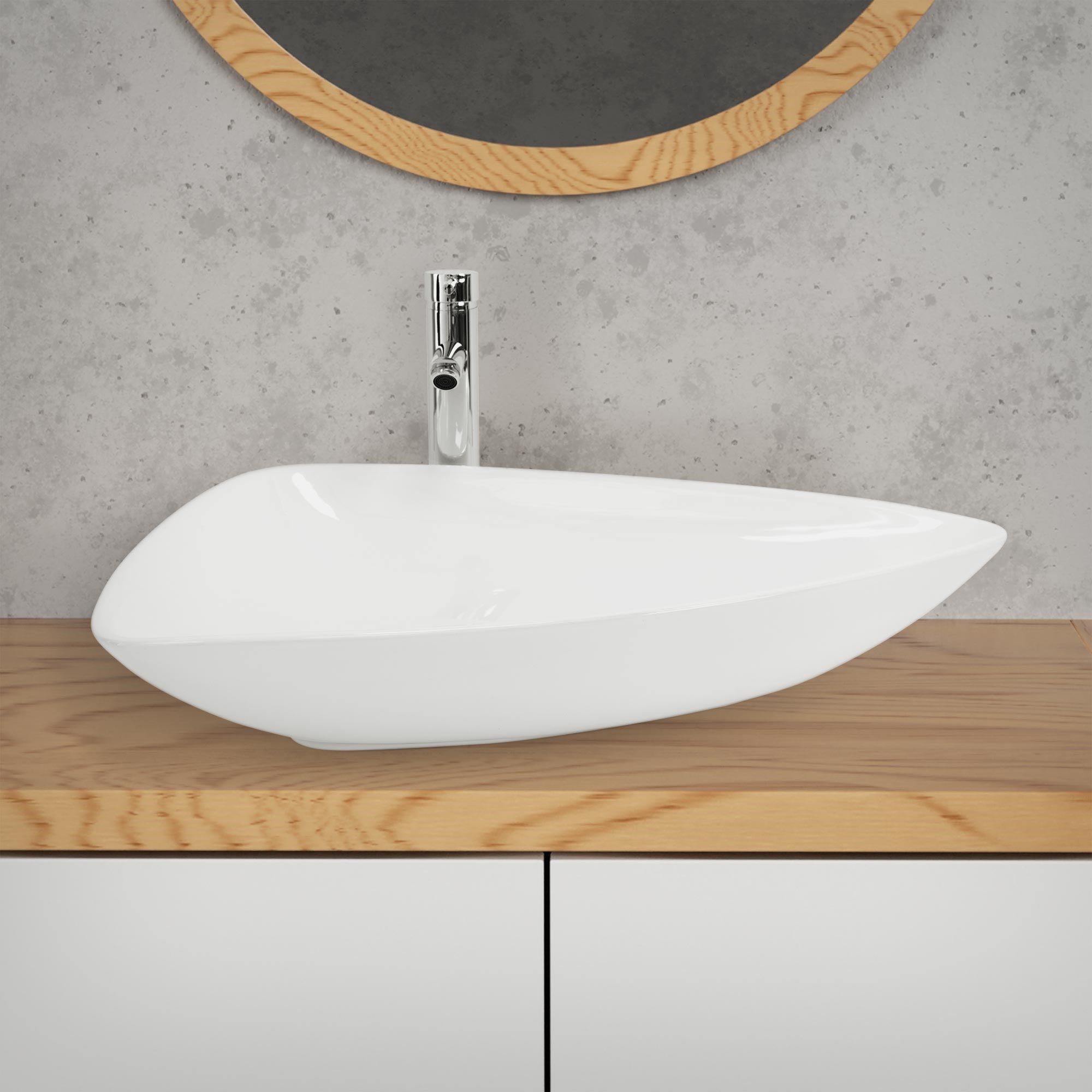 White sink on a wooden shelf in front of a gray wall with mirror.
