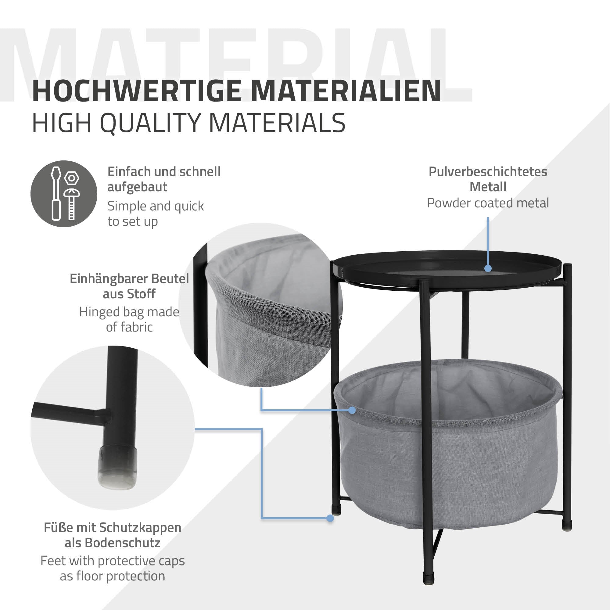 Table with a black metal frame and gray fabric bag, on a light background.