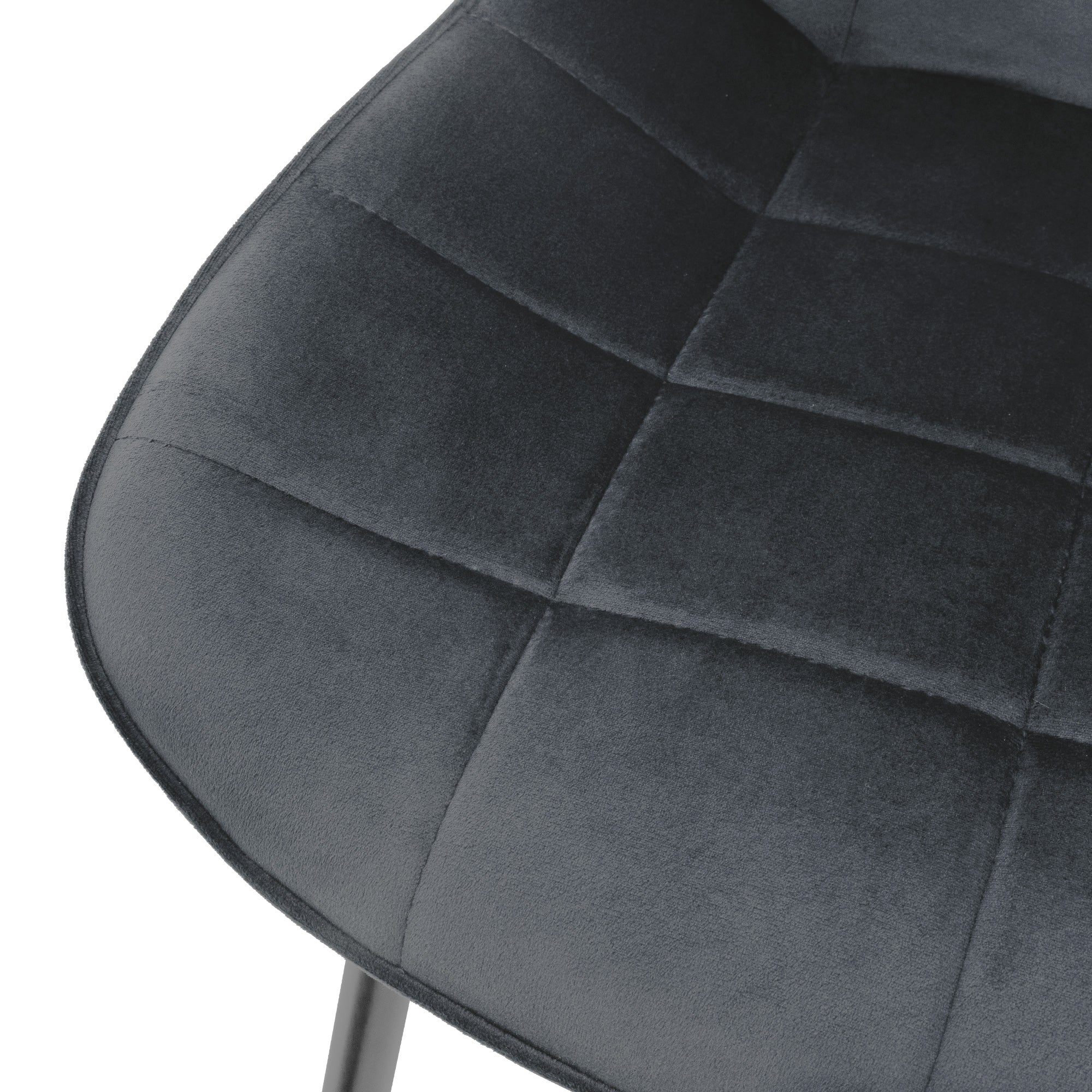 Close-up of the seat of a gray chair with padded cover.