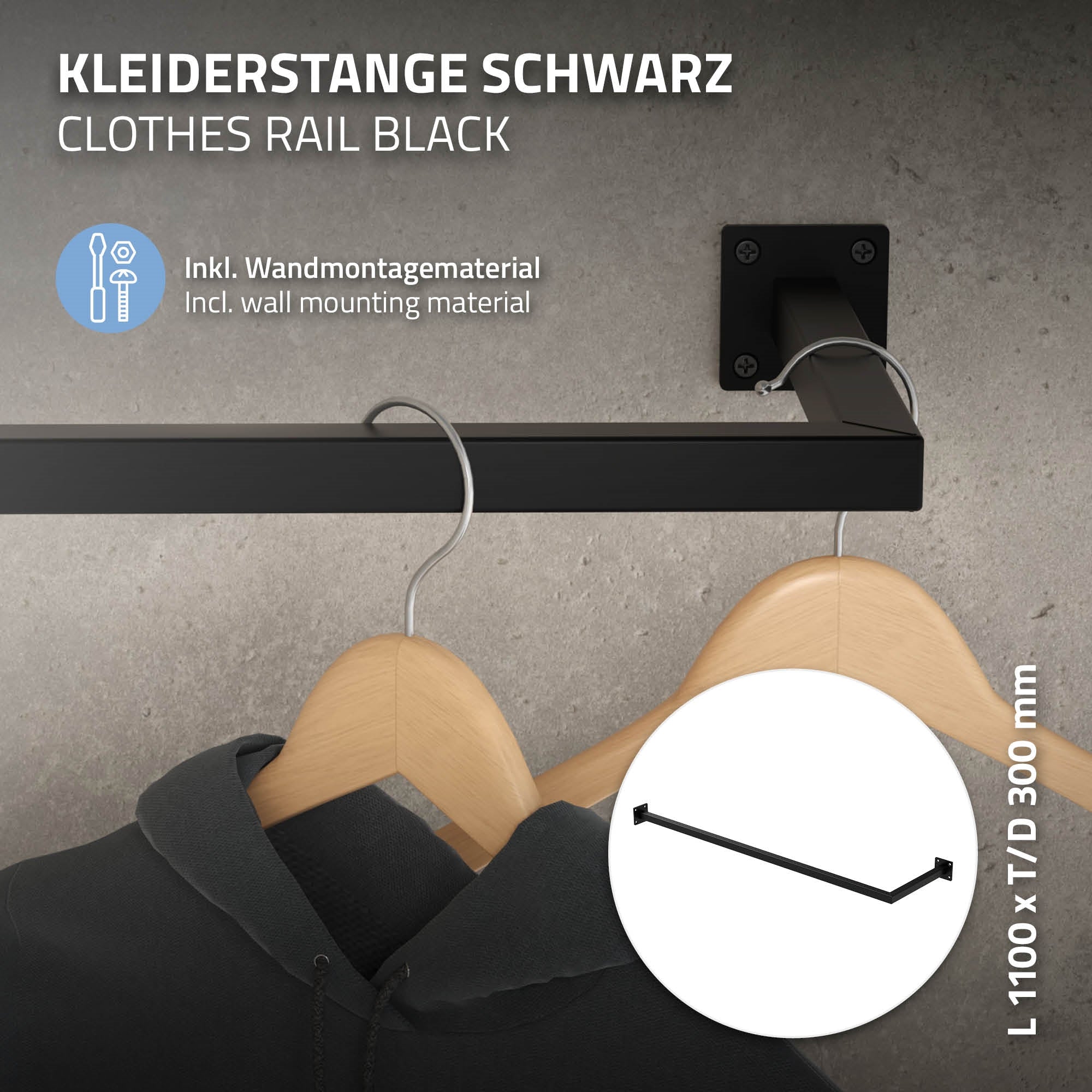 Schwarze Kleiderstange an der Wand mit einem Kleiderbügel.