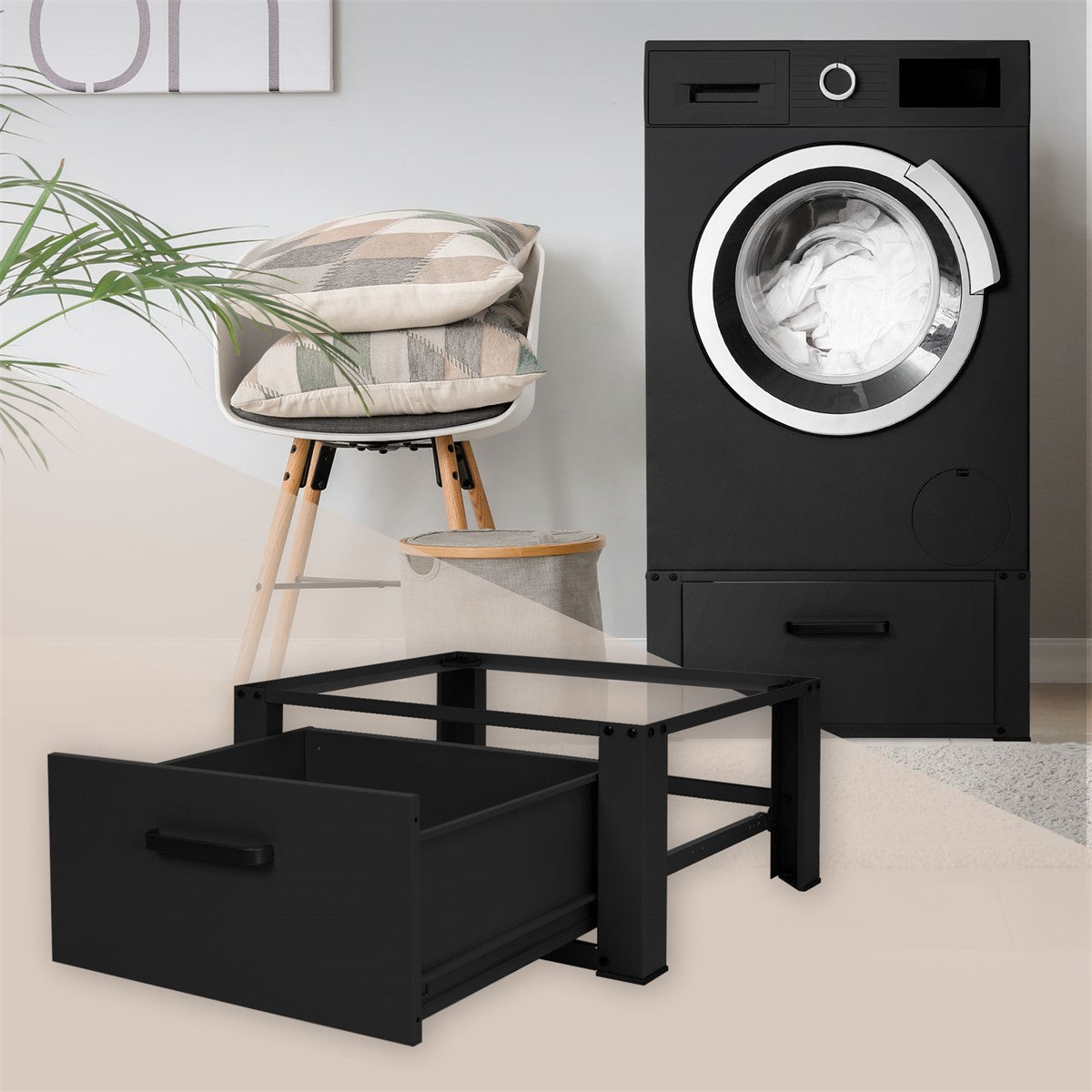 Black washing machine with a laundry basket and a black pedestal in the foreground.