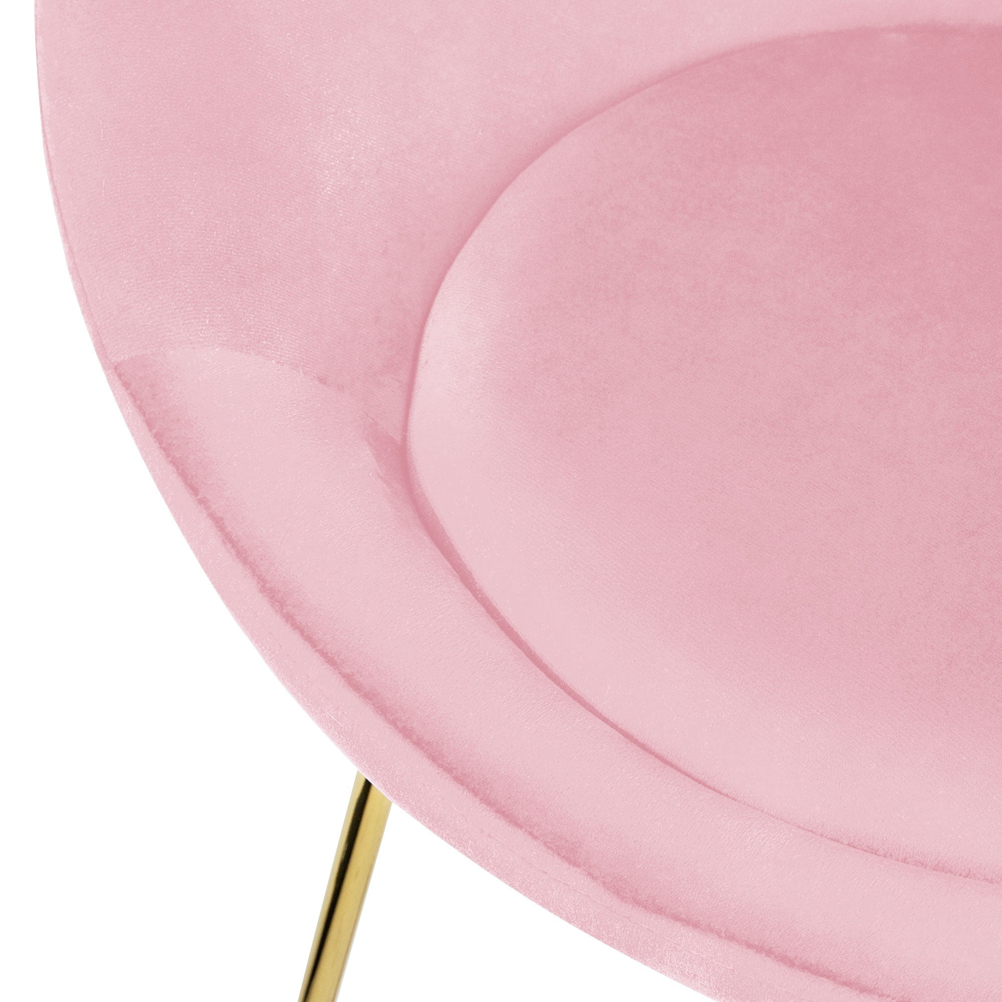 Detailaufnahme eines pinken Sessels mit weicher Polsterung.