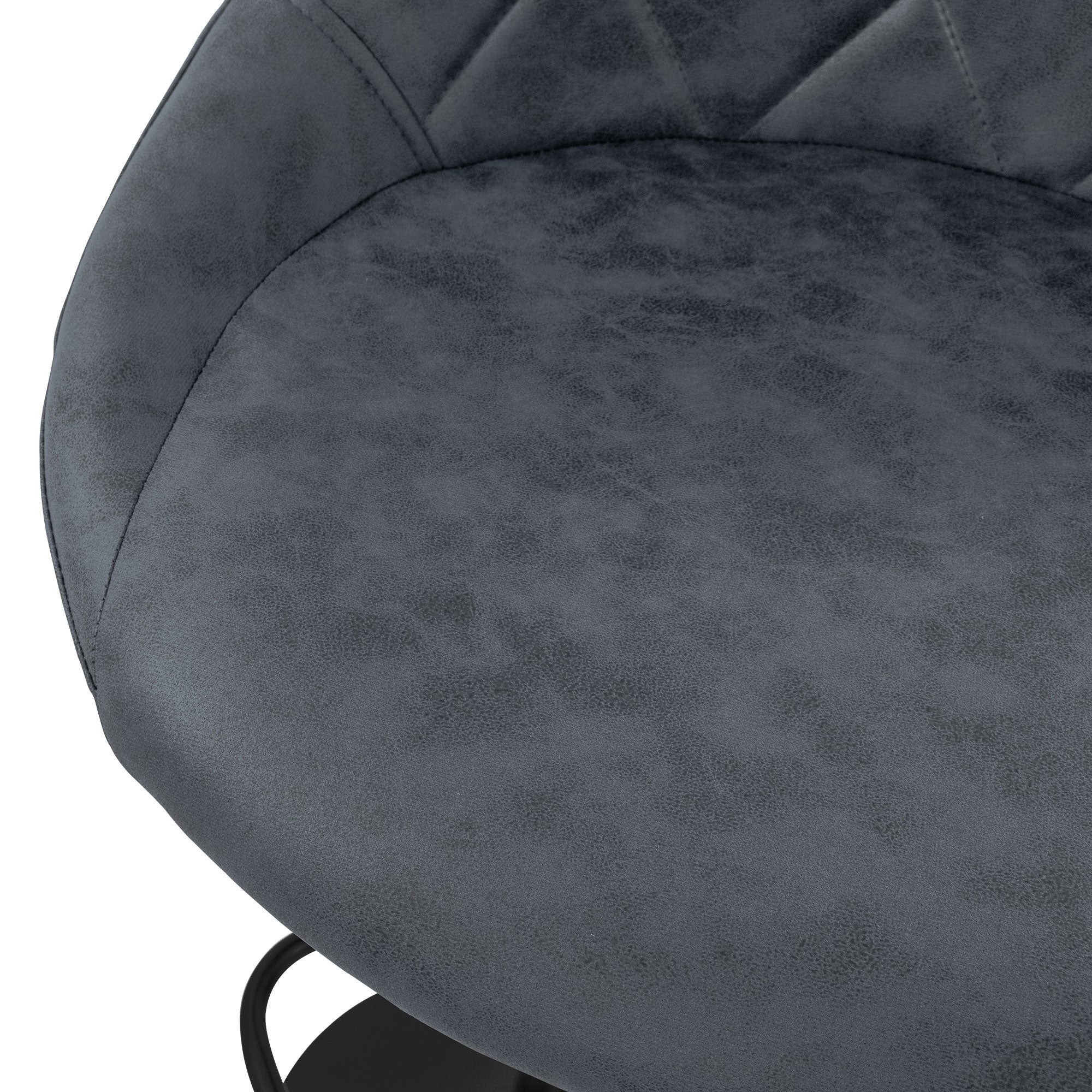 Gros plan d'une chaise grise rembourrée avec un siège rond.