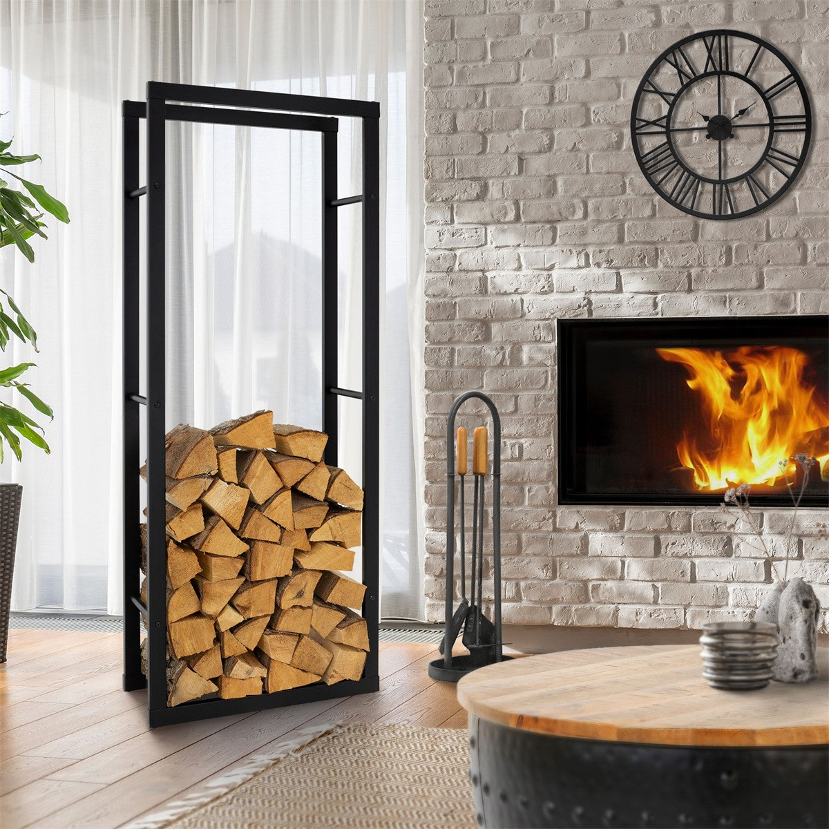 A wooden shelf with wood in front of a fireplace and a clock on the wall, viewed from a different angle.