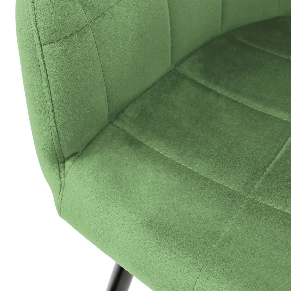 Close-up de uma cadeira verde com assento e encosto estofados.