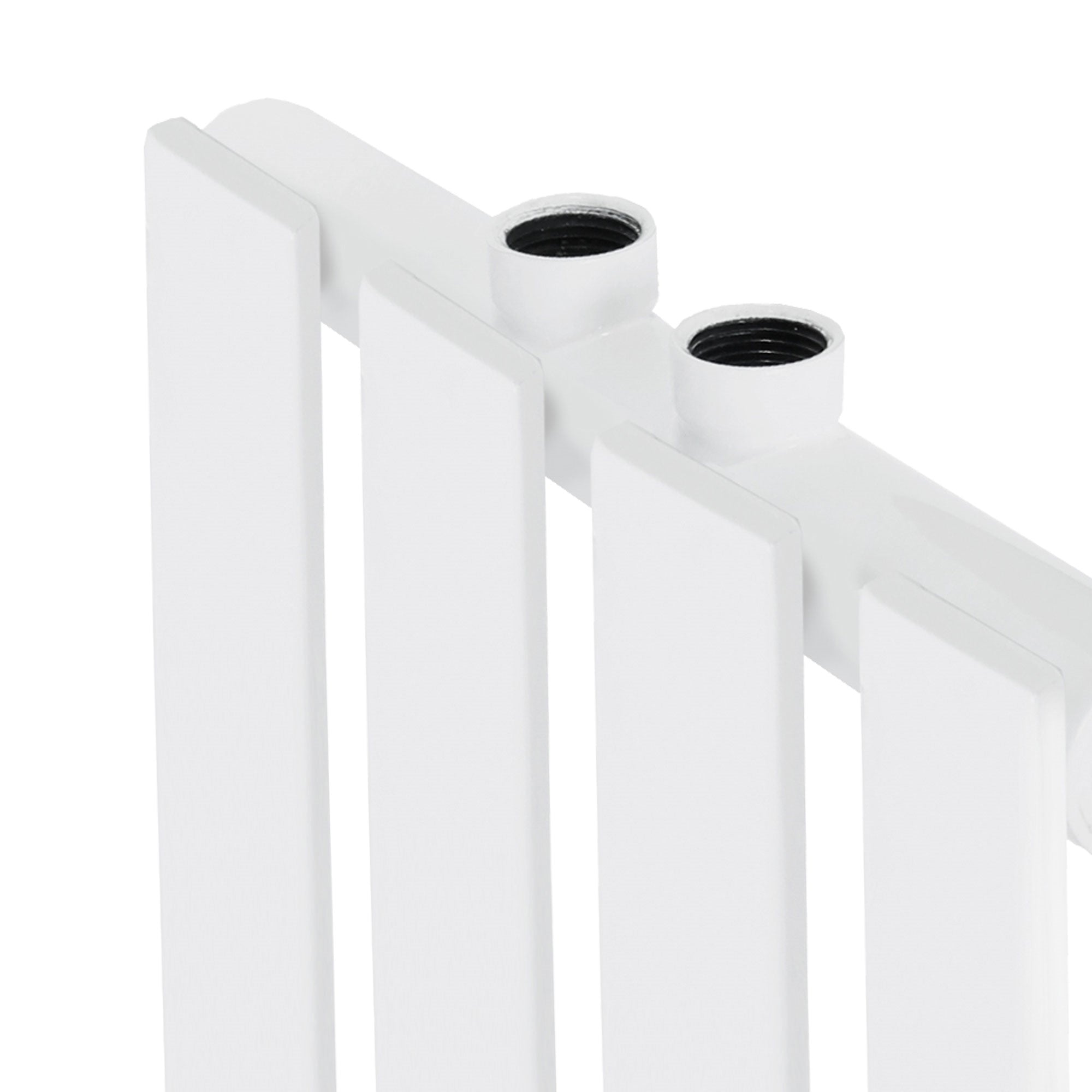 Detail view of a white radiator with two connections.
