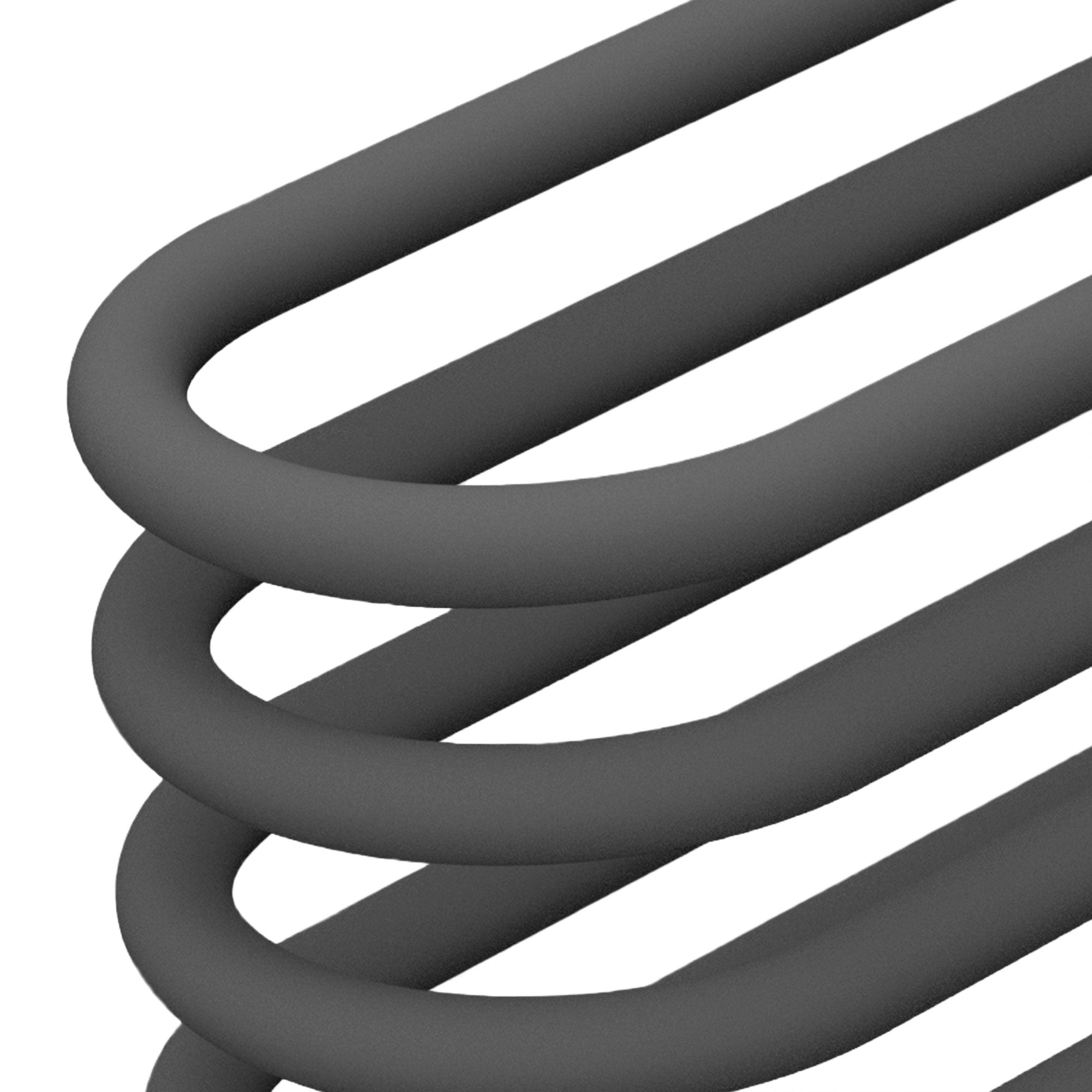 Close-up of an anthracite heating panel with curved pipes.