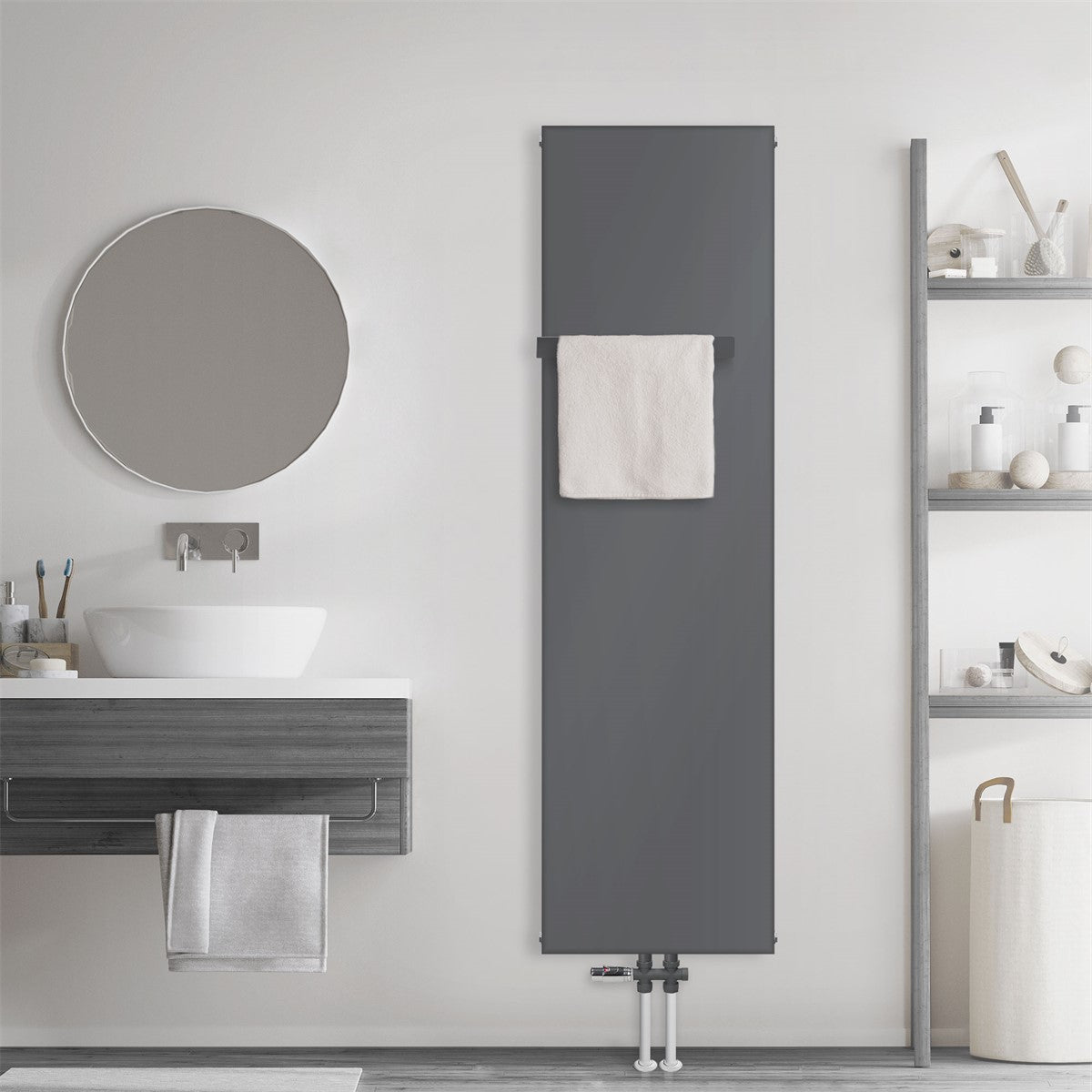 Anthracite radiator with a towel in the bathroom.