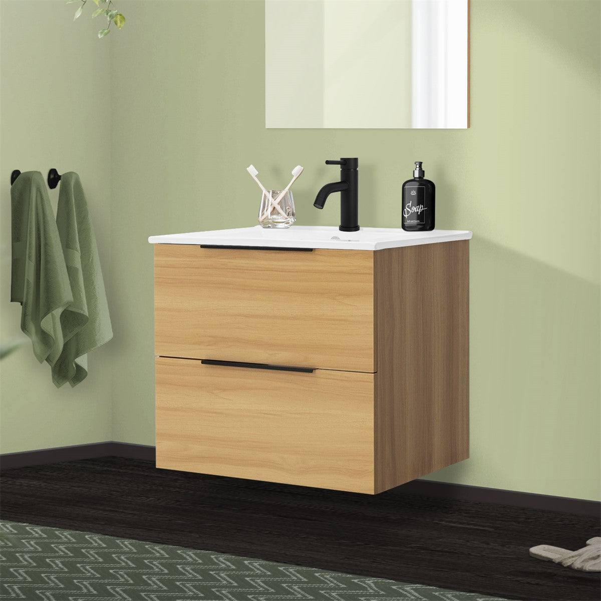Un meuble de salle de bains suspendu avec deux tiroirs et un lavabo.