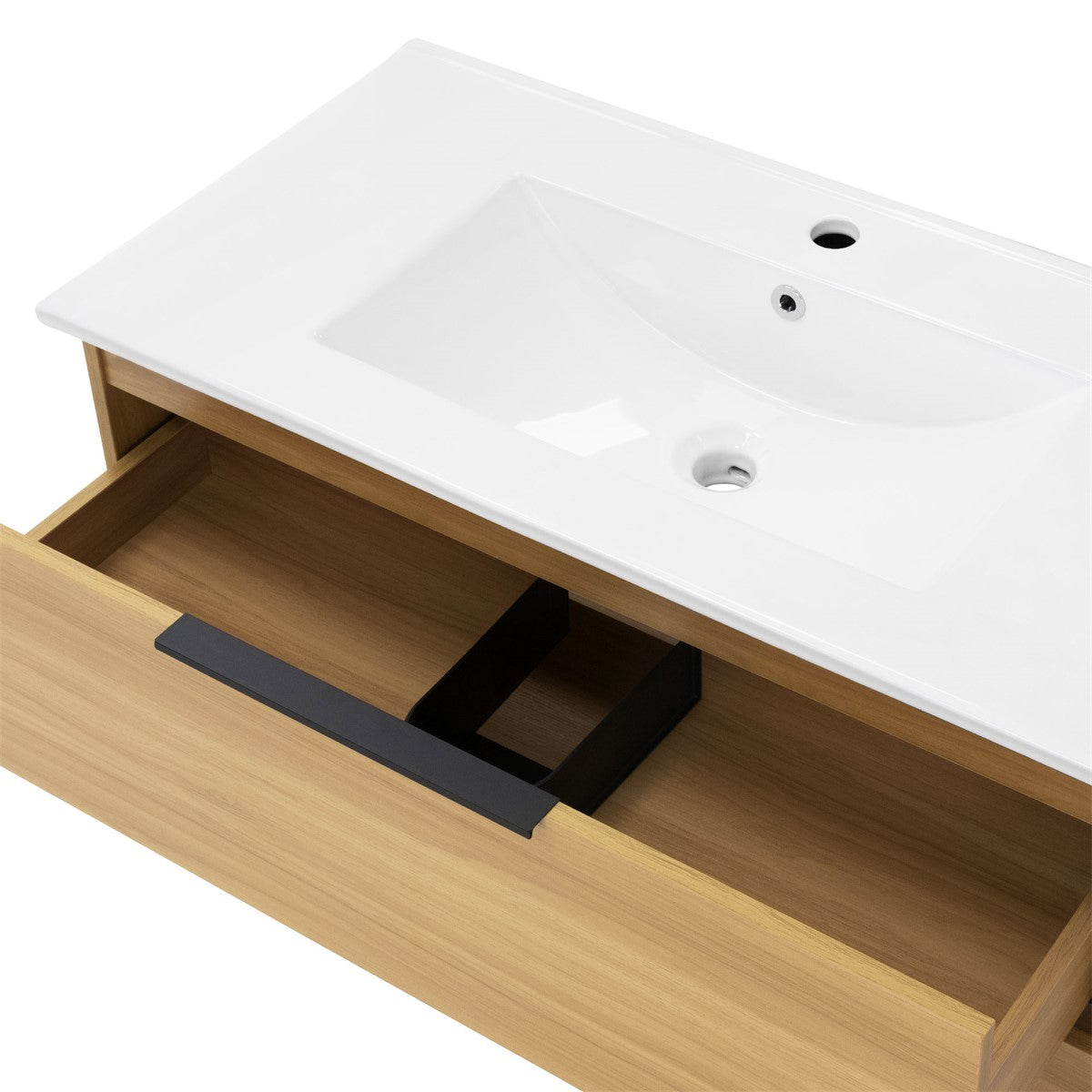 Waschbecken mit Holzunterschrank und zwei Schubladen.