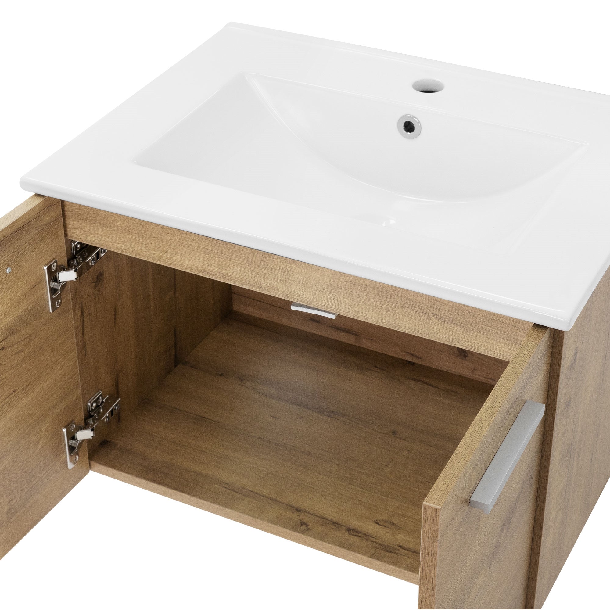 Cajón abierto de un armario de madera con lavabo y estante.