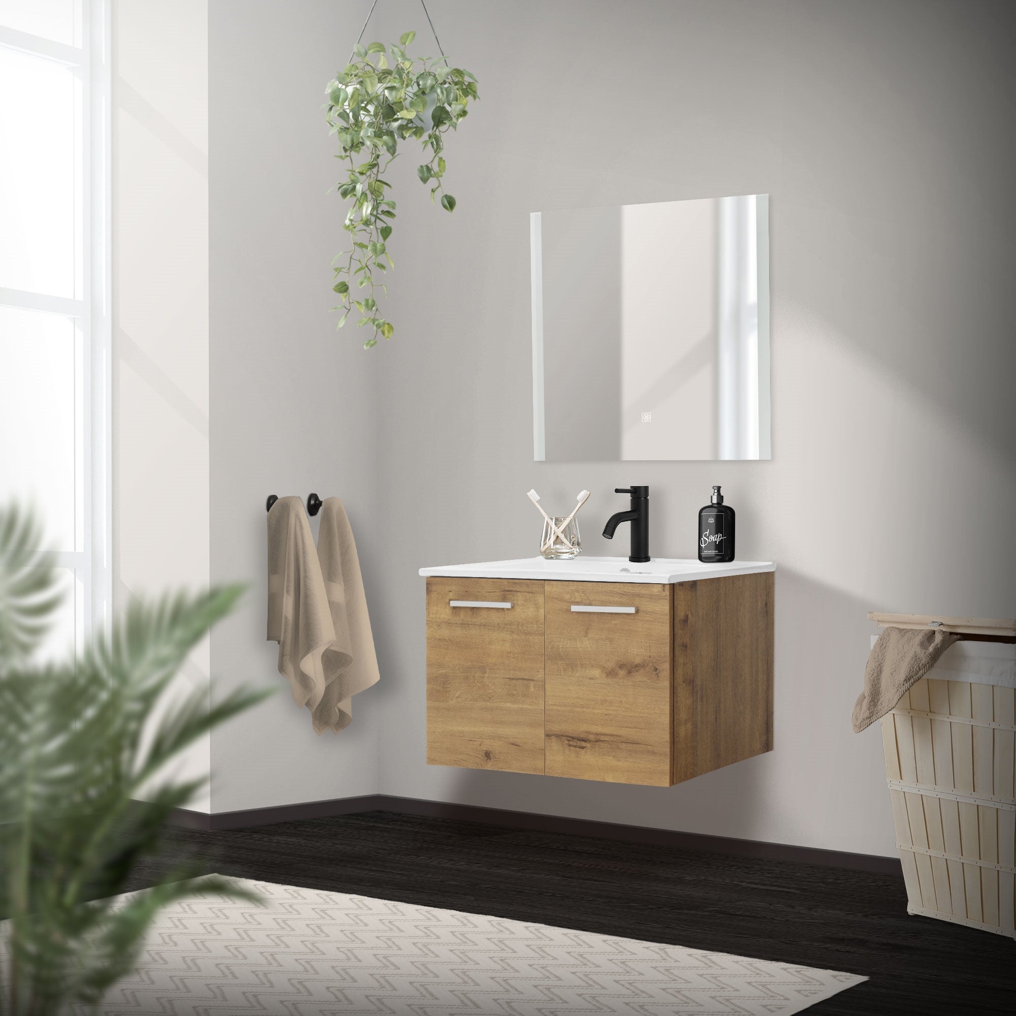 Muebles de baño con lavabo, espejo y plantas de fondo.