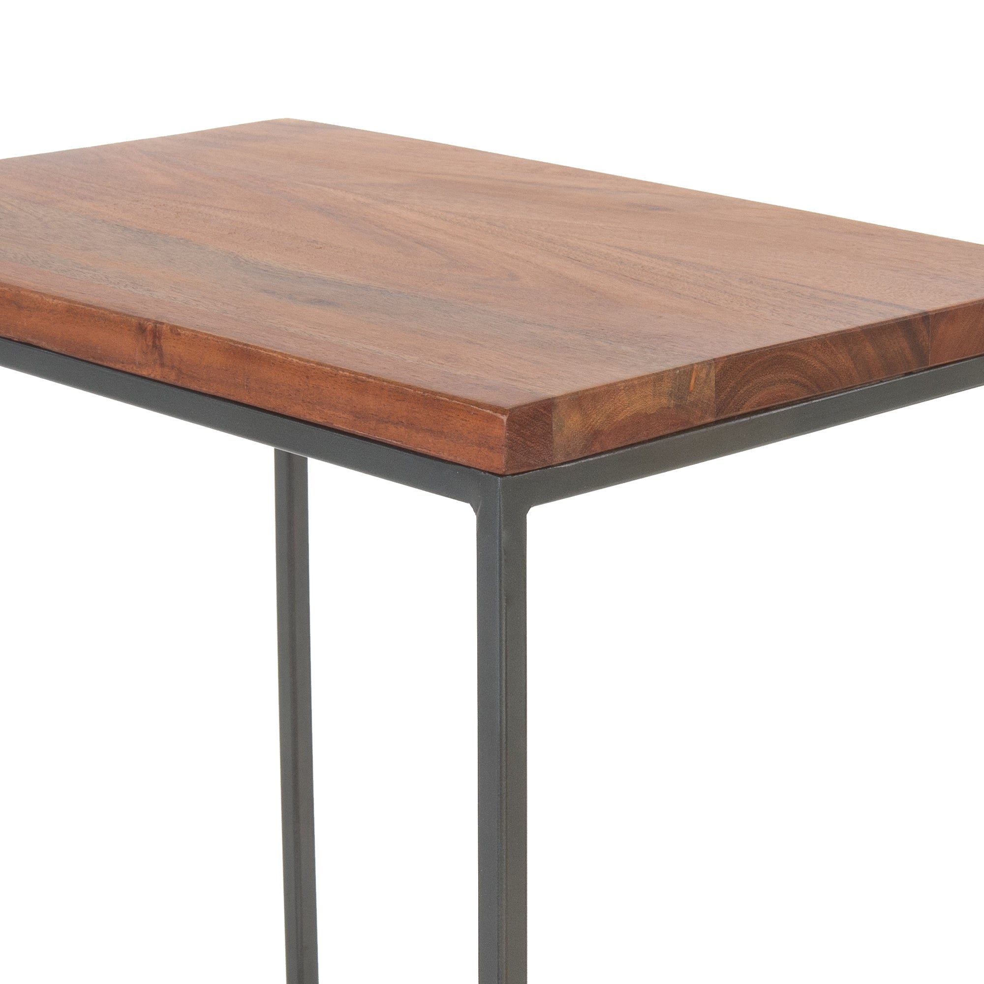 Close-up of a wooden tabletop with a black metal frame.